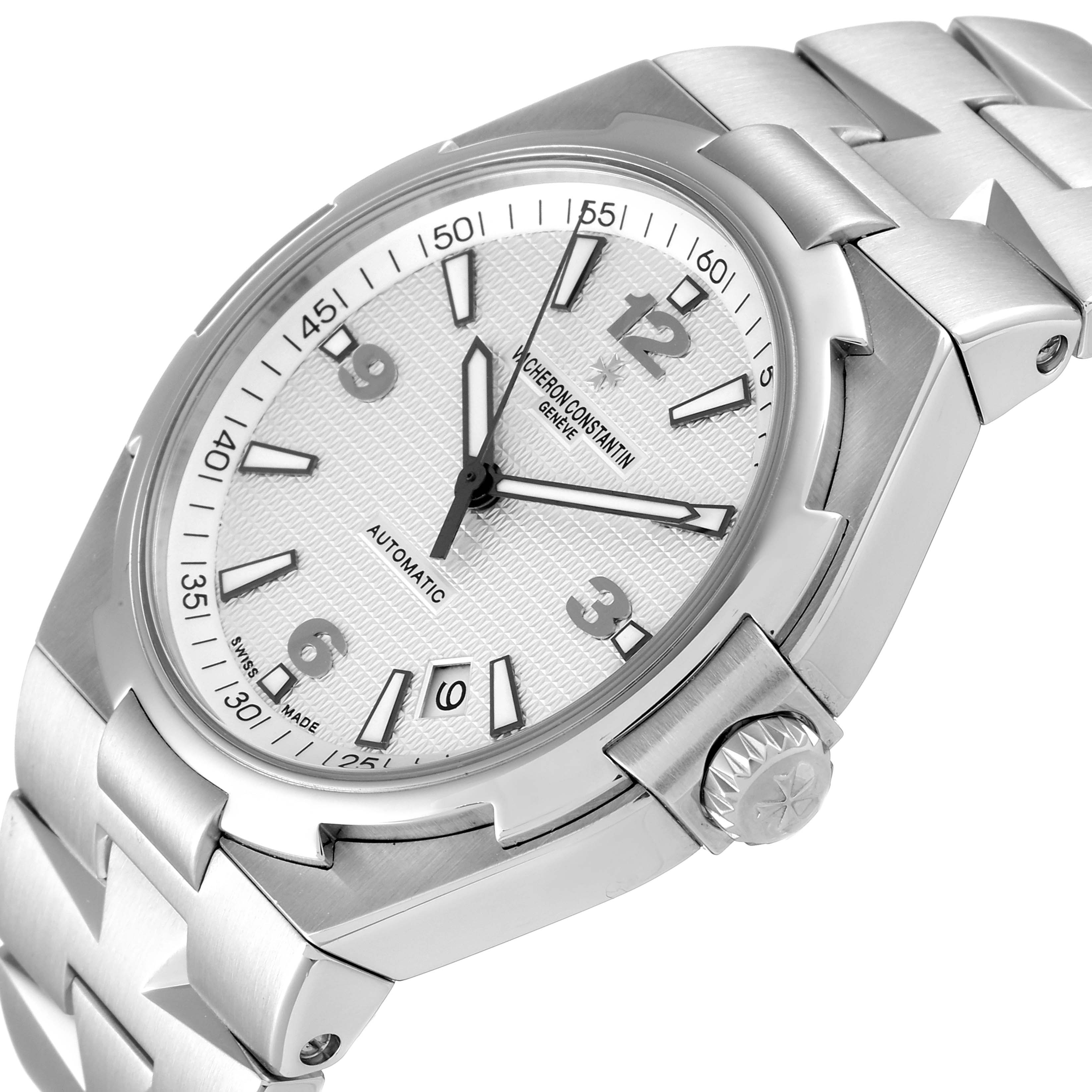 This is an angled view of the Vacheron Constantin Overseas 47040B01A-9093 Men's Stainless Steel Silver Dial 47040B01A-9093 Men's Stainless Steel Silver Dial model displaying its face, crown, and part of the bracelet.