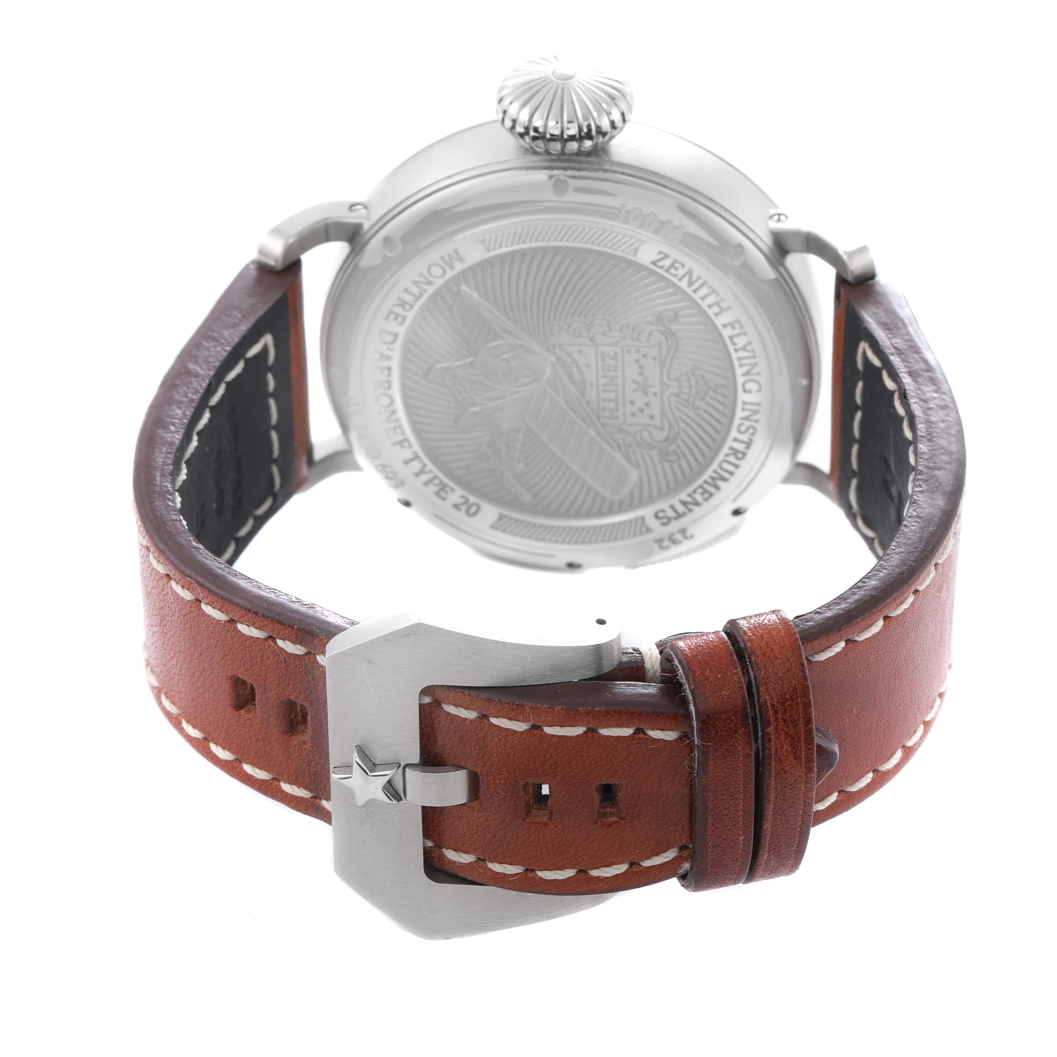 The image shows the back of the Zenith Pilot 03.2430.693 Men
s Stainless Steel Black Dial watch, highlighting the case back, leather strap, and star-emblazoned buckle.