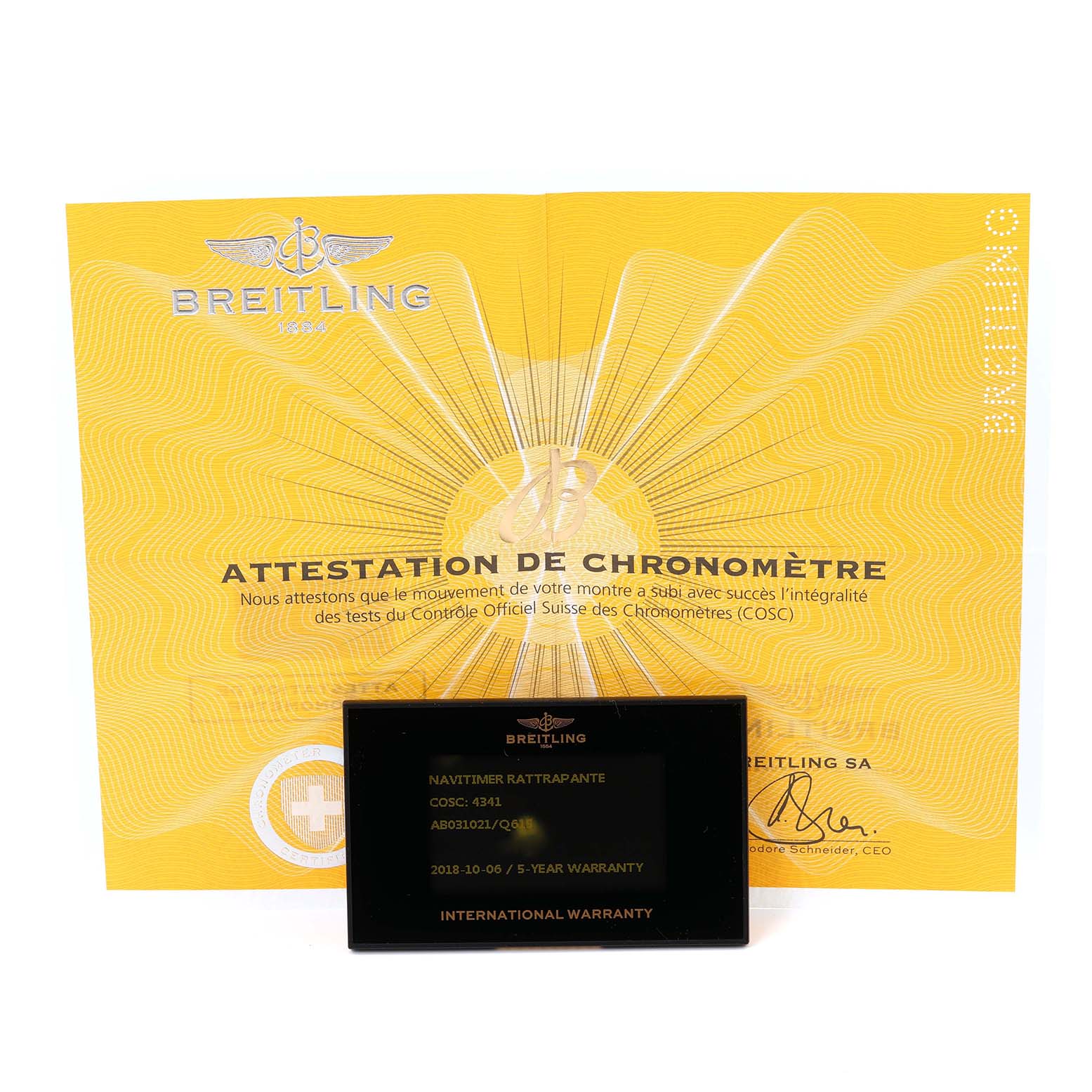 This image shows the warranty card and certificate for a Breitling Navitimer AB031021/Q615 Men's Stainless Steel Brown Dial AB031021/Q615 Men's Stainless Steel Brown Dial watch.