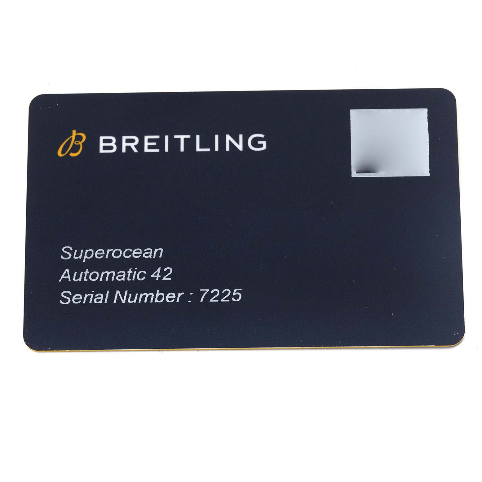 This is a close-up of the Breitling Superocean A17366 Men
s Stainless Steel Black Dial A17366 Men
s Stainless Steel Black Dial warranty card showing the model, serial number, and brand logo.