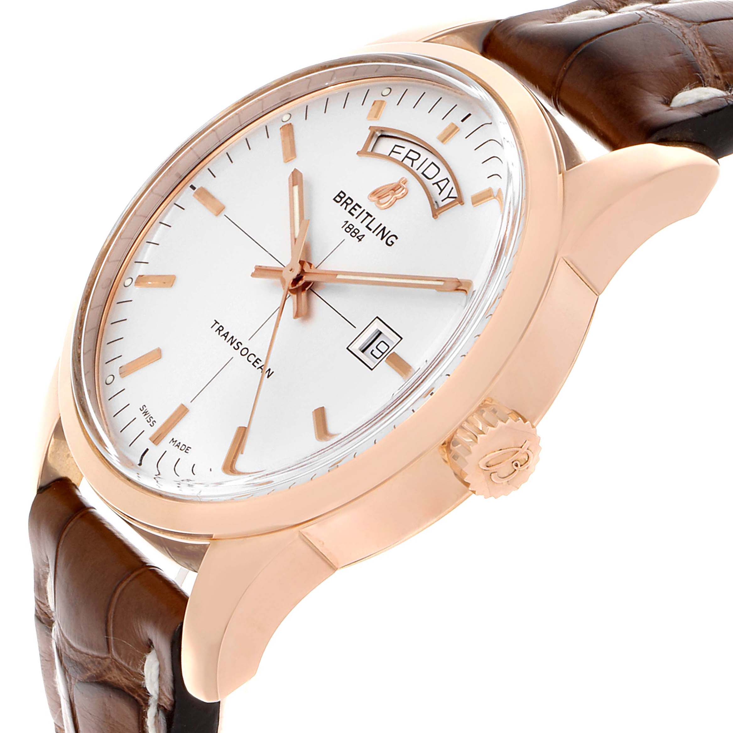 This Breitling Transocean R45310 Men's Rose Gold Silver Dial R45310 Men's Rose Gold Silver Dial watch is shown in a side angle, highlighting its face, crown, and leather strap.