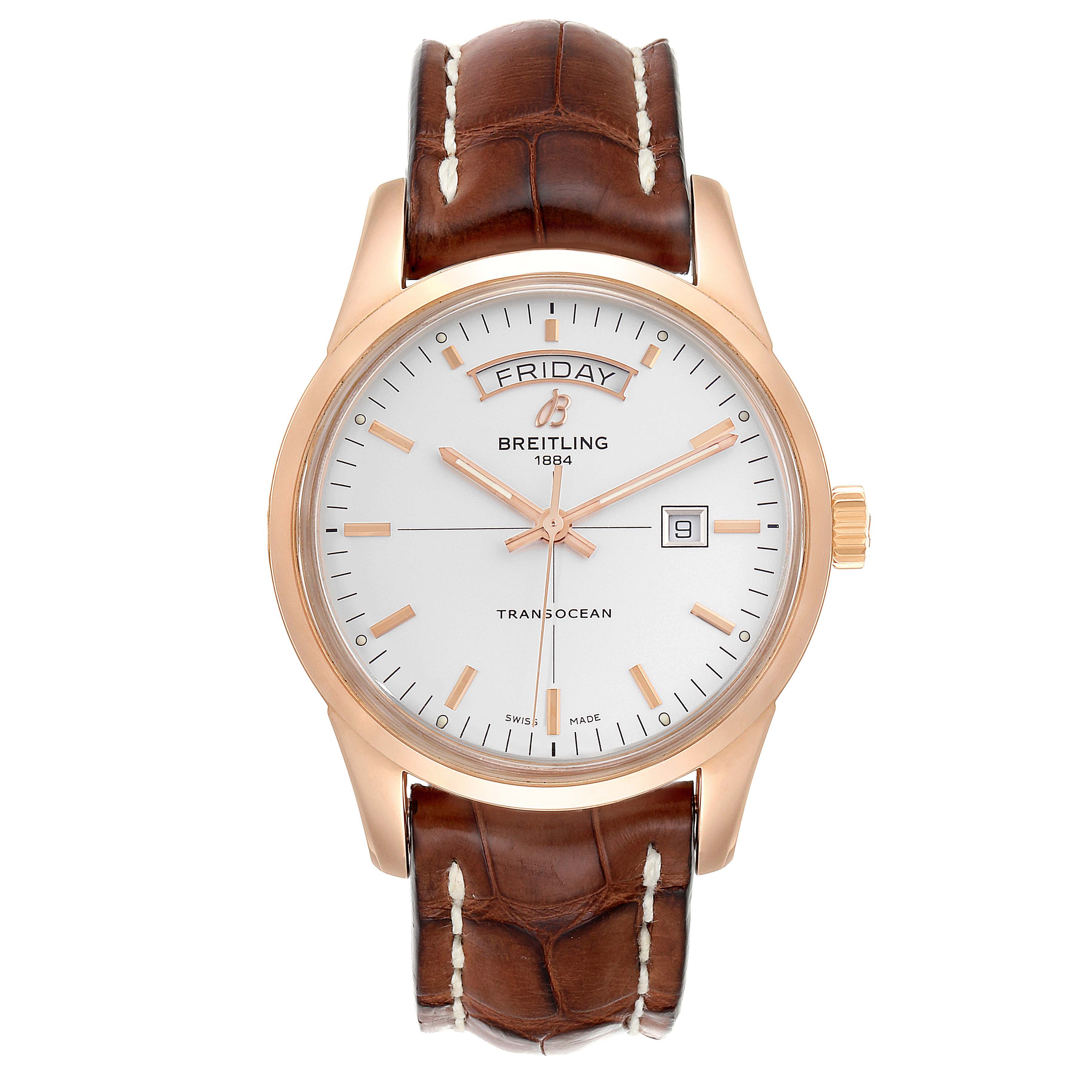 The image shows a front view of the Breitling Transocean R45310 Men's Rose Gold Silver Dial R45310 Men's Rose Gold Silver Dial watch, featuring its dial, case, and brown leather strap.