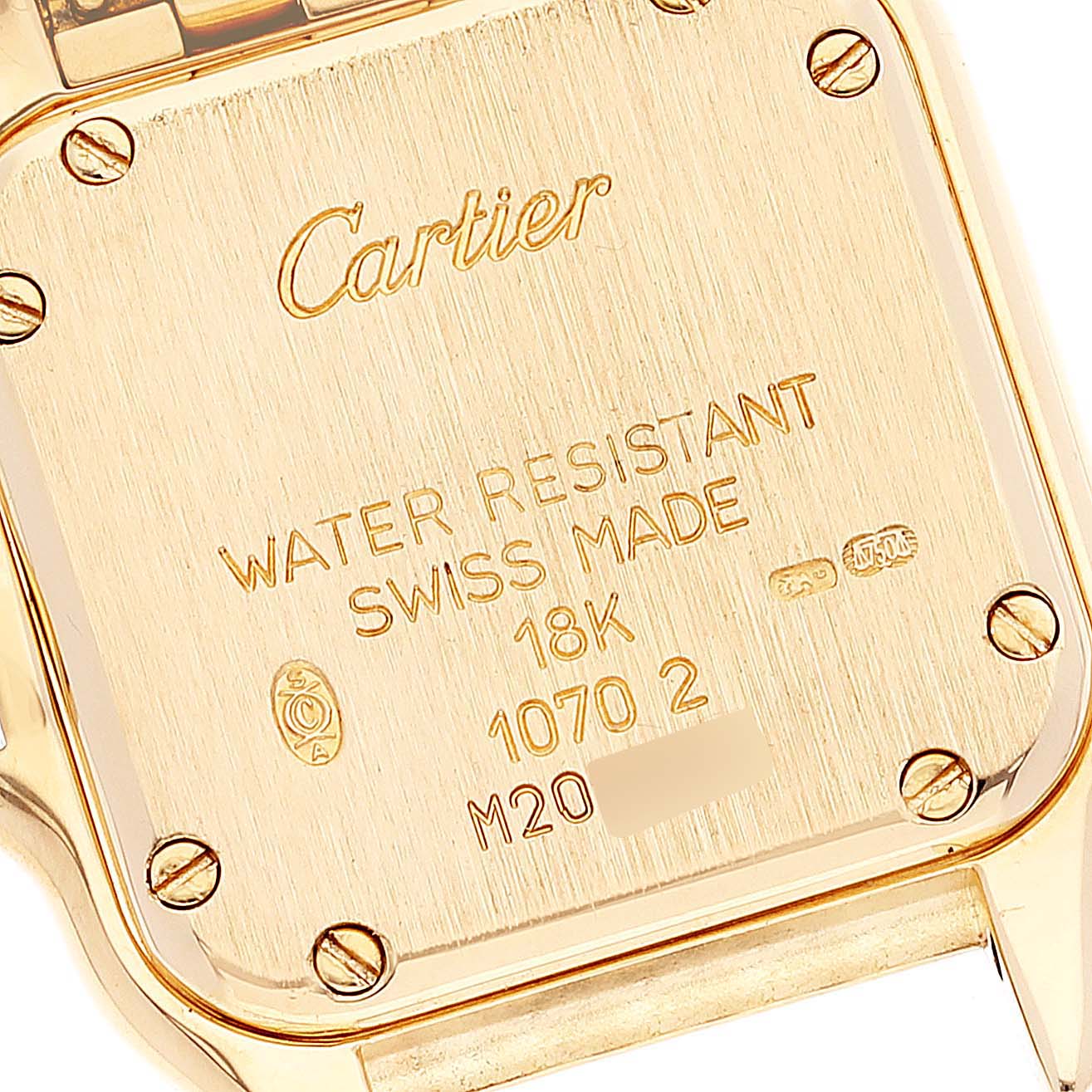 The image shows the back case of the Cartier Panthere W25022B9 Women's Yellow Gold Silver Dial W25022B9 Women's Yellow Gold Silver Dial watch, highlighting the brand engravings and material specifications.