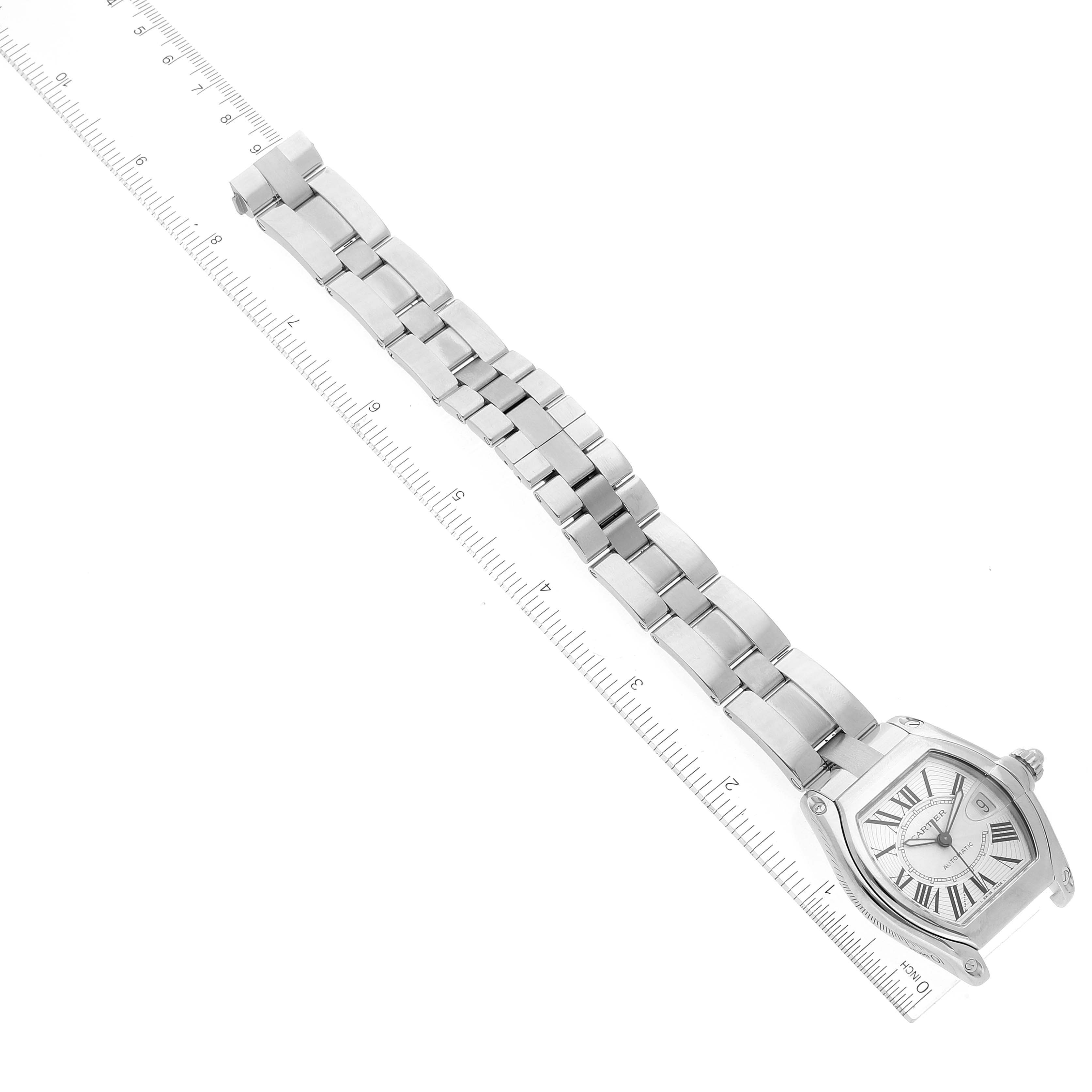 The image shows an overhead view of a Cartier Roadster W62025V3 Men
s Stainless Steel Silver Dial W62025V3 Men
s Stainless Steel Silver Dial watch, highlighting the entire bracelet and watch face.