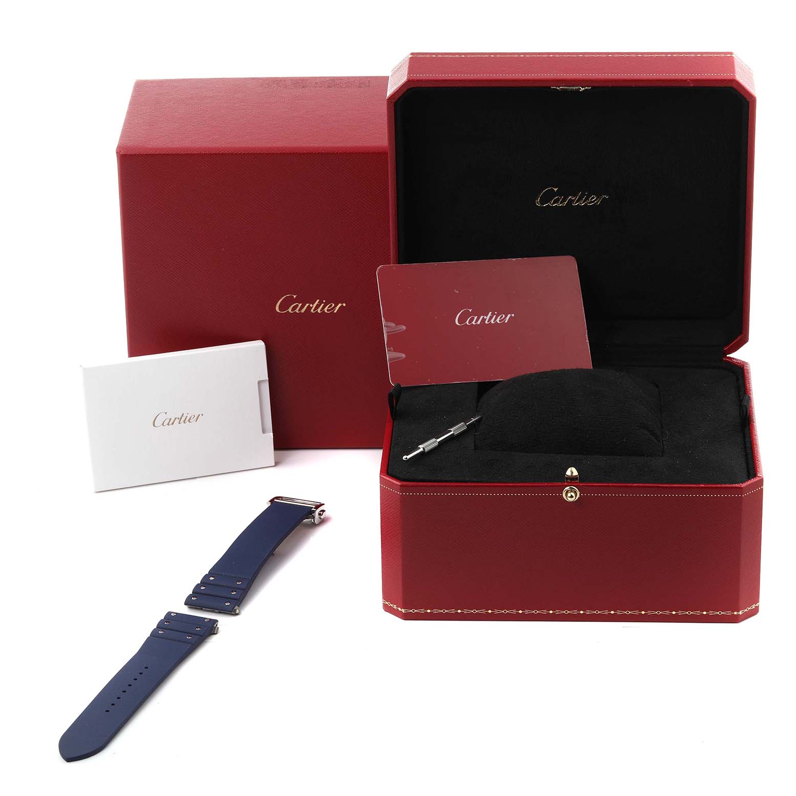 The image shows a Cartier Santos WSSA0047 Men's Stainless Steel Silver Dial WSSA0047 Men's Stainless Steel Silver Dial watch box, warranty card, an extra strap, and a tool for adjusting the strap.