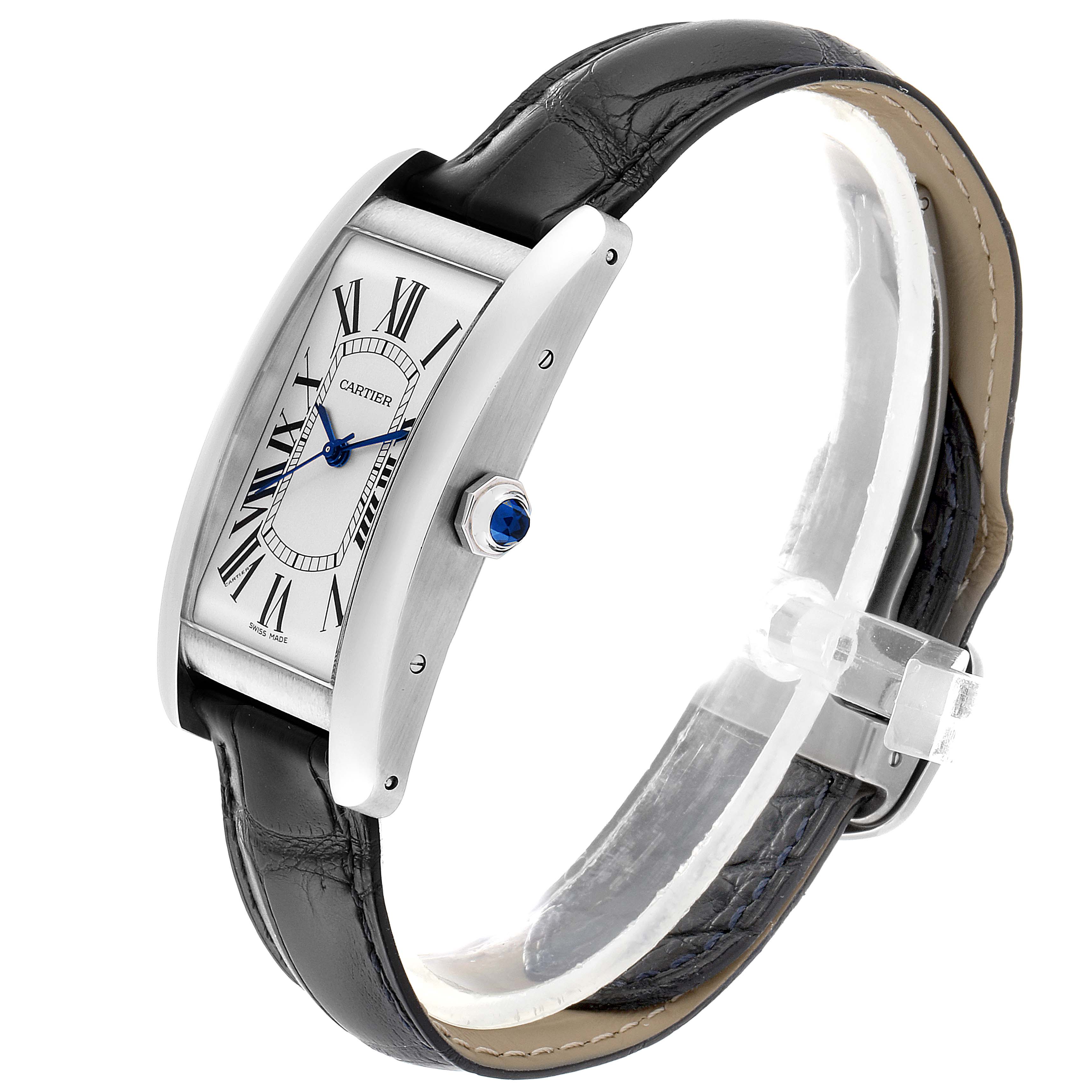 The image shows a Cartier Tank Americaine WSTA0018 Men's Stainless Steel Silver Dial WSTA0018 Men's Stainless Steel Silver Dial watch at a three-quarter angle, highlighting its dial, crown with blue cabochon, and leather strap.