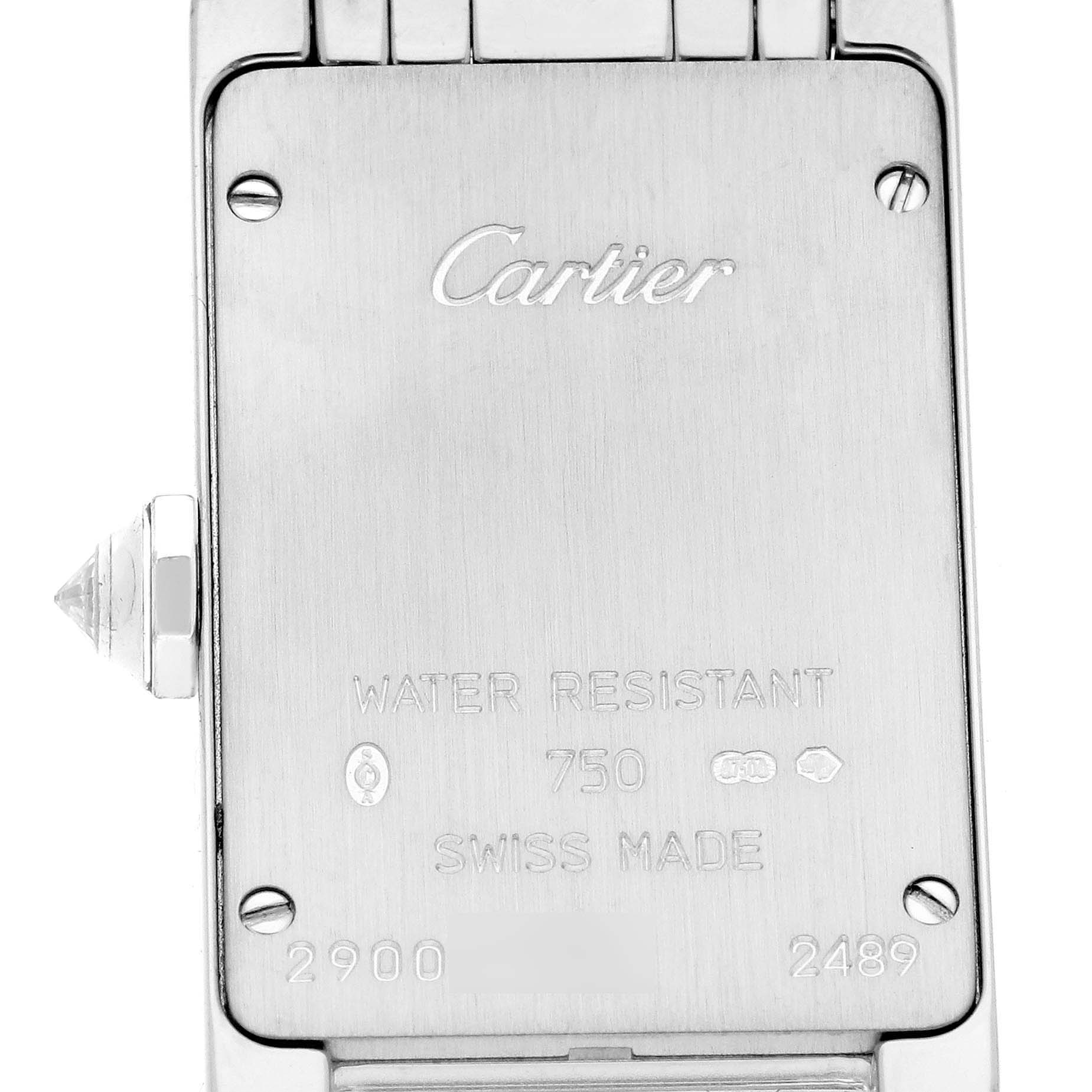 The image shows the back case of a Cartier Tank Americaine WB7073L1 Women's White Gold Silver Dial WB7073L1 Women's White Gold Silver Dial watch, highlighting the brand engraving and water resistance details.