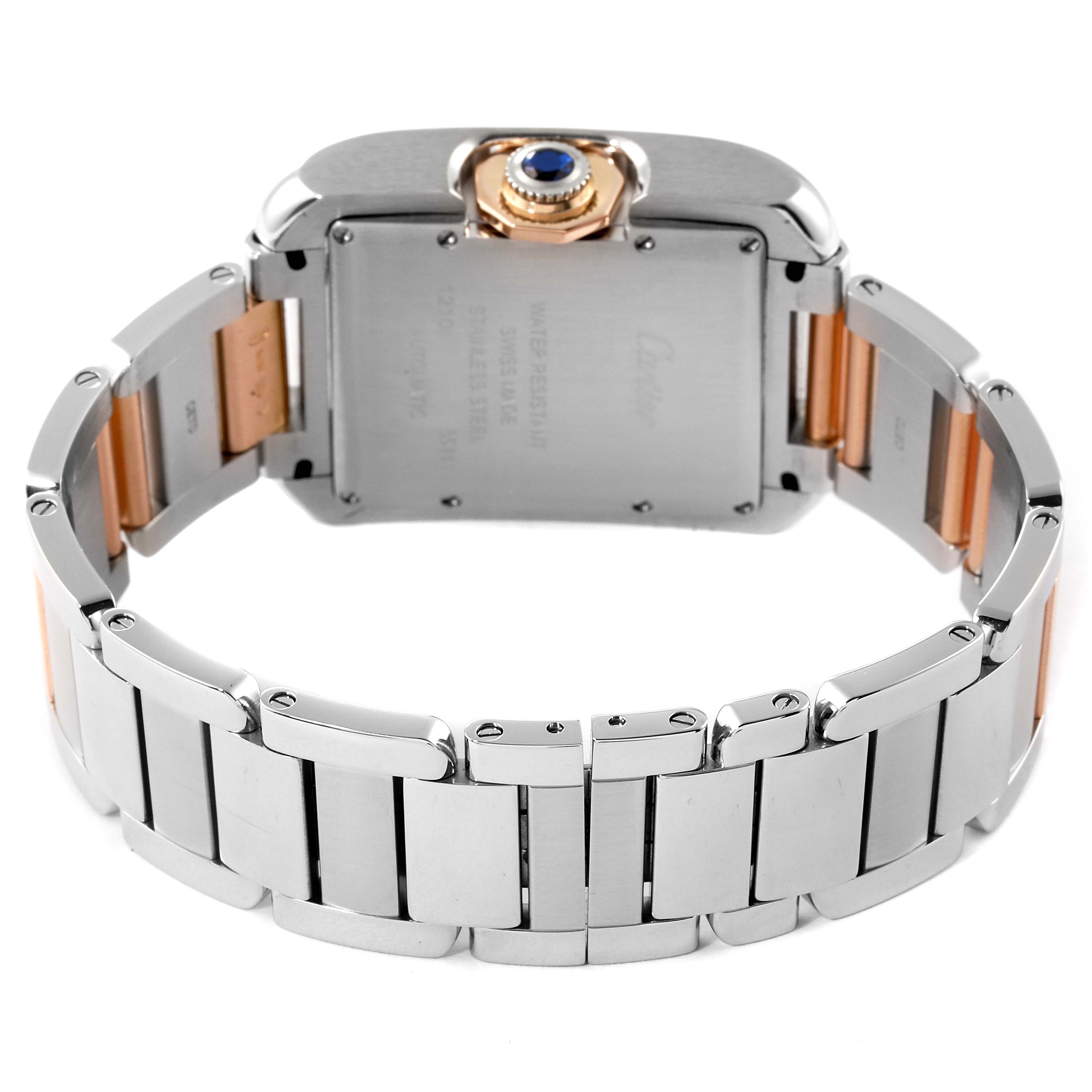 The image shows the back view of a Cartier Tank Anglaise WT100025 Women
s Steel and Gold (two tone) Silver Dial WT100025 Women
s Steel and Gold (two tone) Silver Dial watch, highlighting its case, crown, and bracelet.