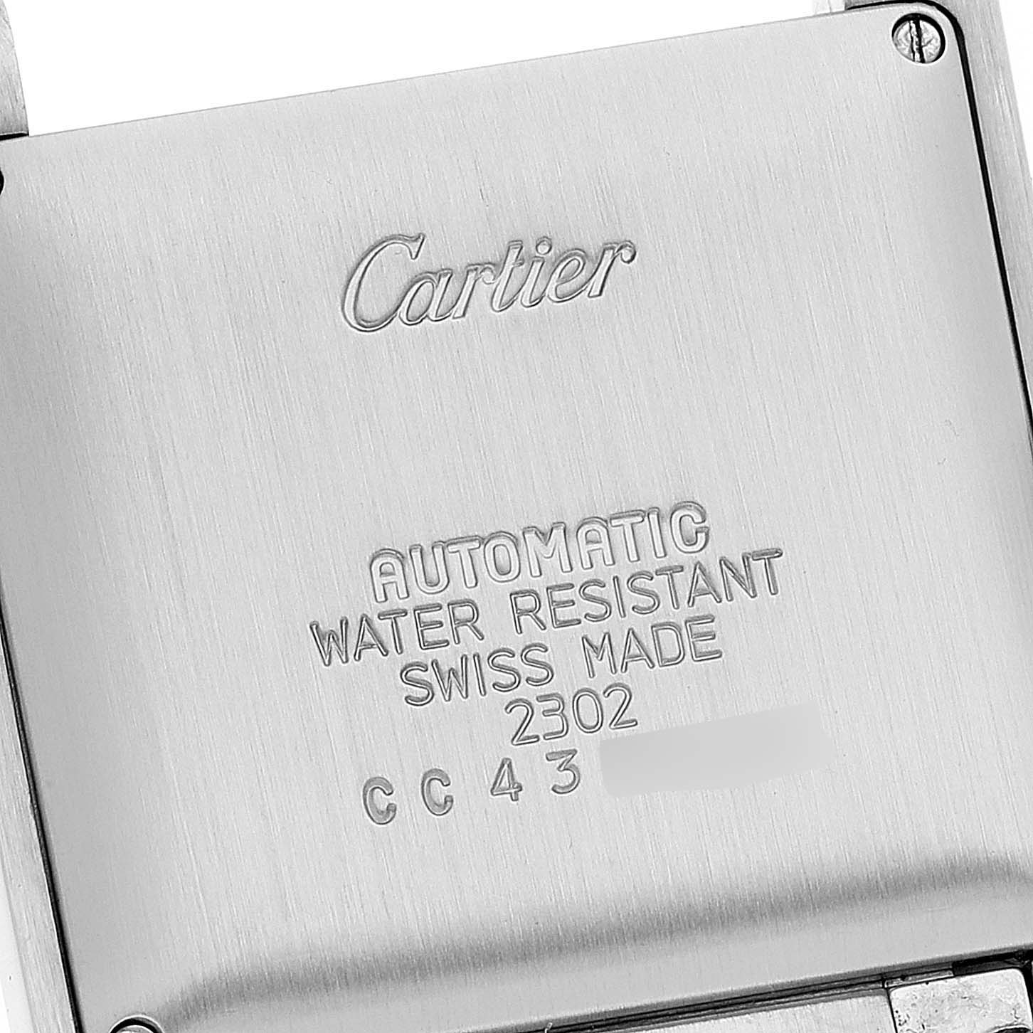 This is a close-up image of the back case of a Cartier Tank Francaise W51002Q3 Men's Stainless Steel Silver Dial W51002Q3 Men's Stainless Steel Silver Dial watch, showing the brand logo and various specifications.