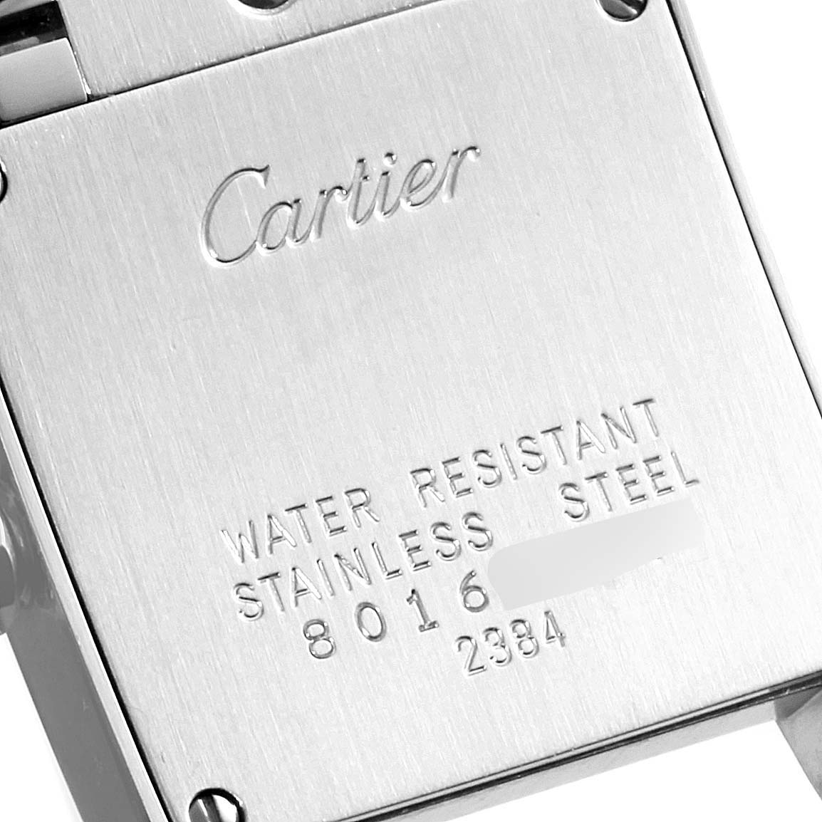 The image shows the back case of a Cartier Tank Francaise W51028Q3 Women
s Stainless Steel Mother of Pearl Dial W51028Q3 Women
s Stainless Steel Mother of Pearl Dial watch, highlighting the brand, model information, and material details.