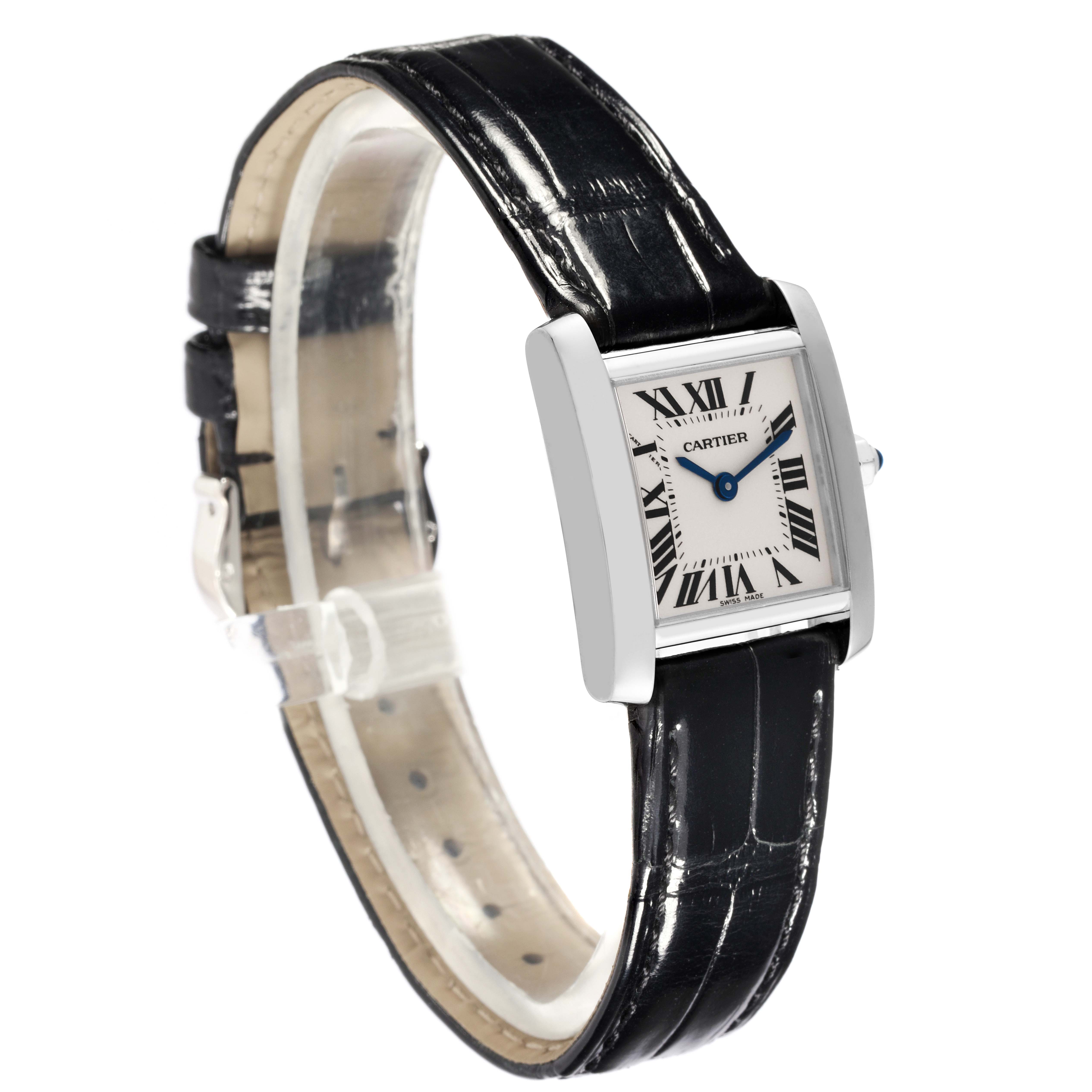 This Cartier Tank Francaise W5001256 Women's White Gold Silver Dial W5001256 Women's White Gold Silver Dial watch is angled to show the face, bezel, and leather strap.