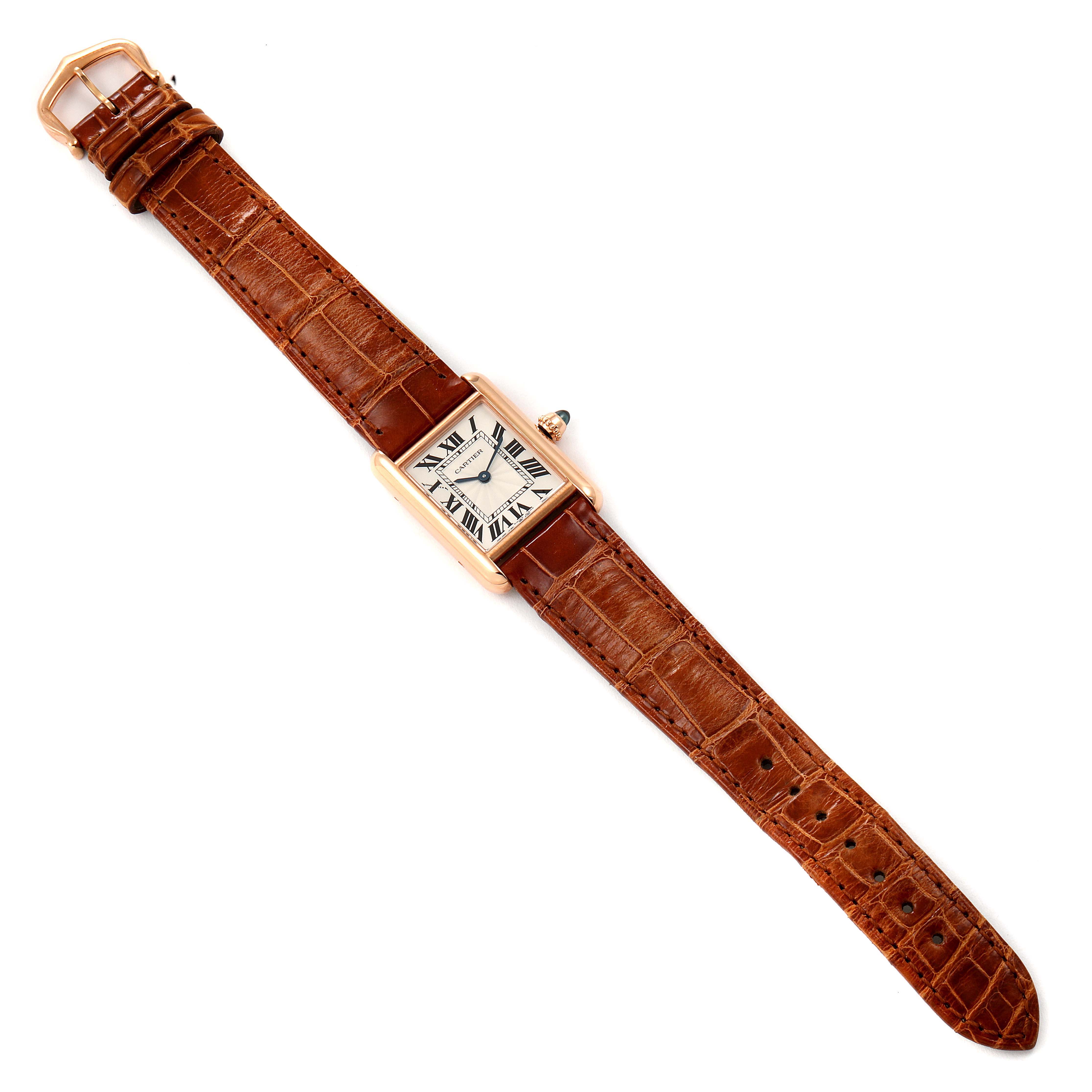 The Tank Louis model by Cartier is shown from a top-down angle, displaying the entire watch including the face, strap, and buckle.