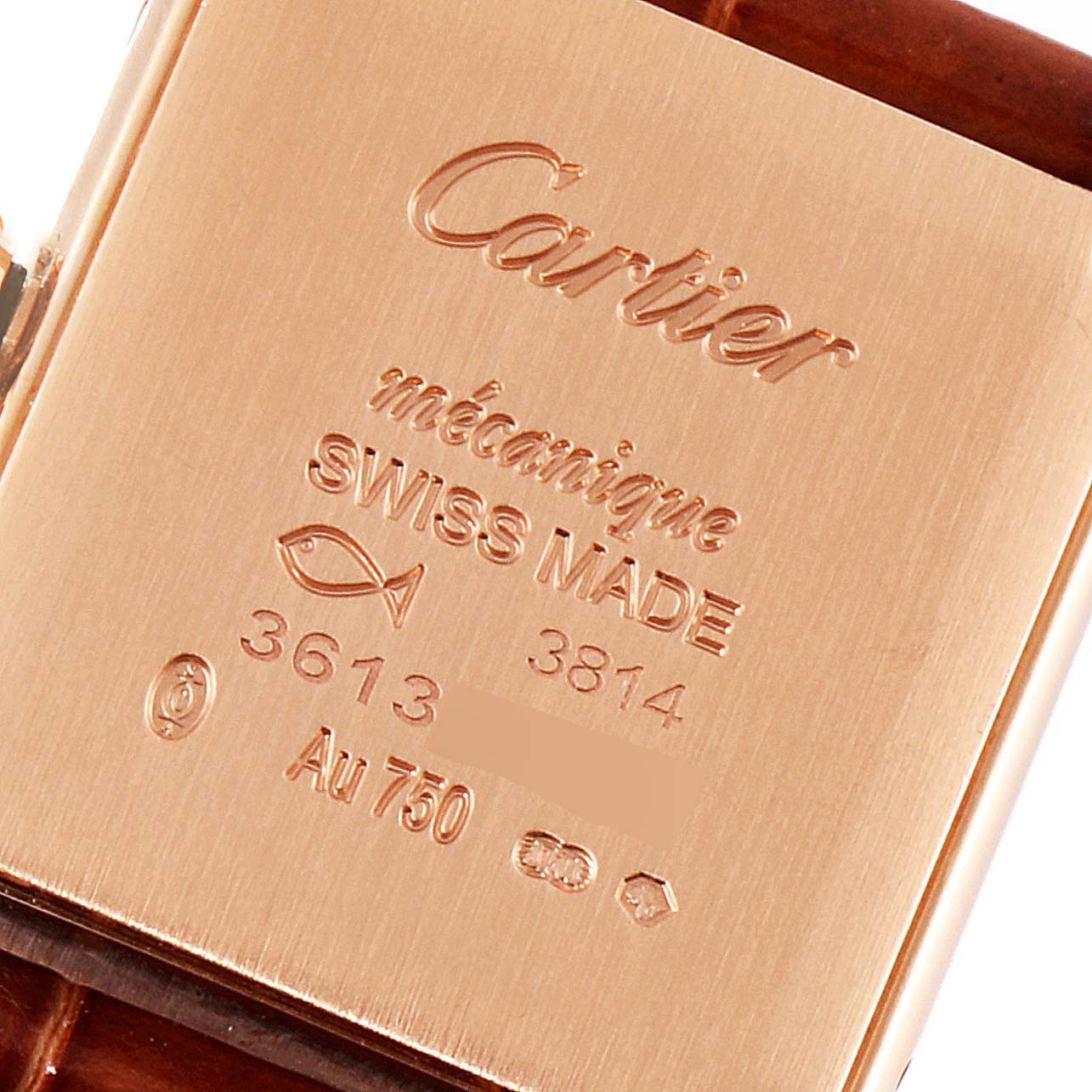 The image shows a close-up of the back case of a Cartier Tank Louis WGTA0010 Women's Rose Gold Silver Dial WGTA0010 Women's Rose Gold Silver Dial watch.
