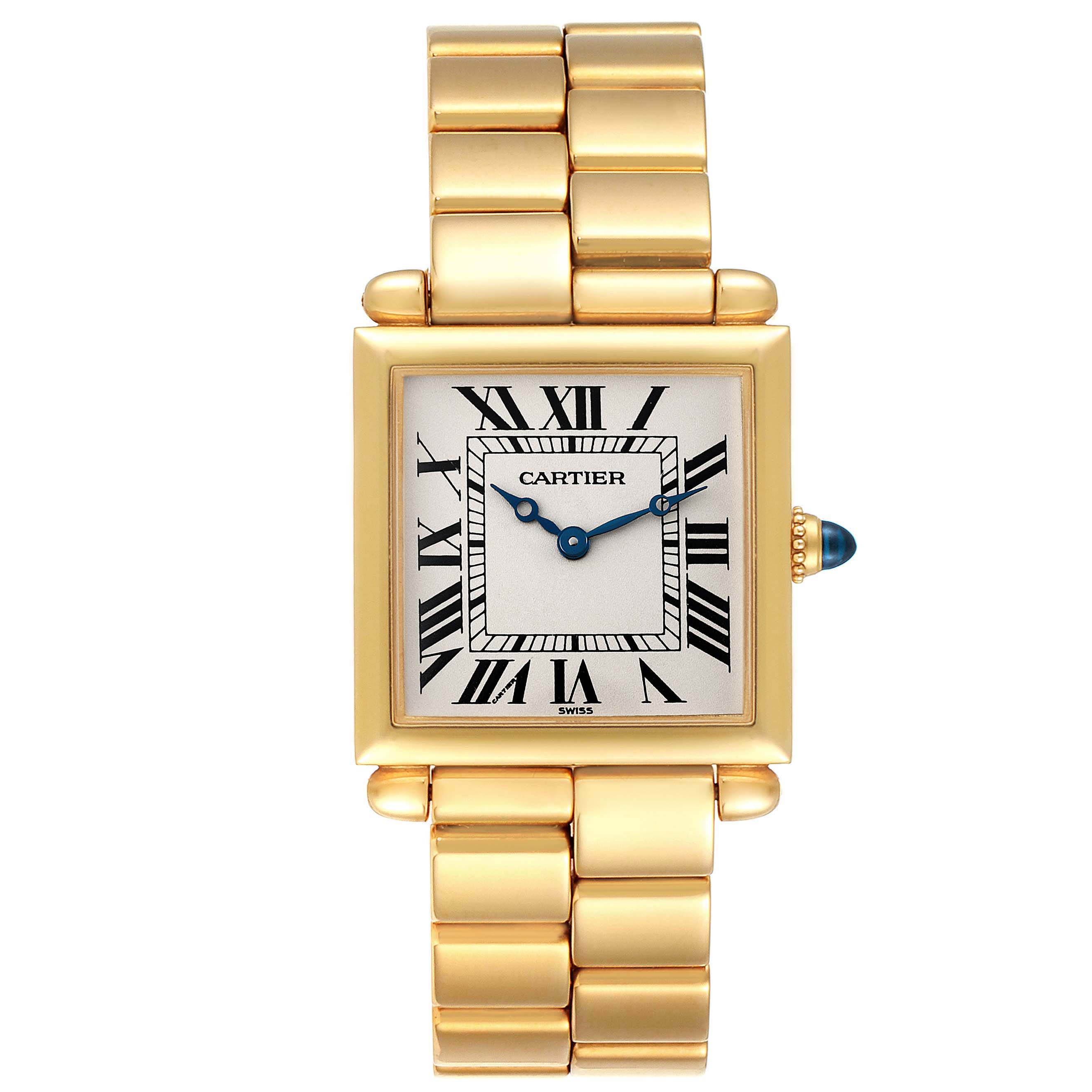 The image shows a front view of the Cartier Tank Obus W15122N7 Women's Yellow Gold Silver Dial W15122N7 Women's Yellow Gold Silver Dial watch, highlighting its gold casing, bracelet, and Roman numeral dial.