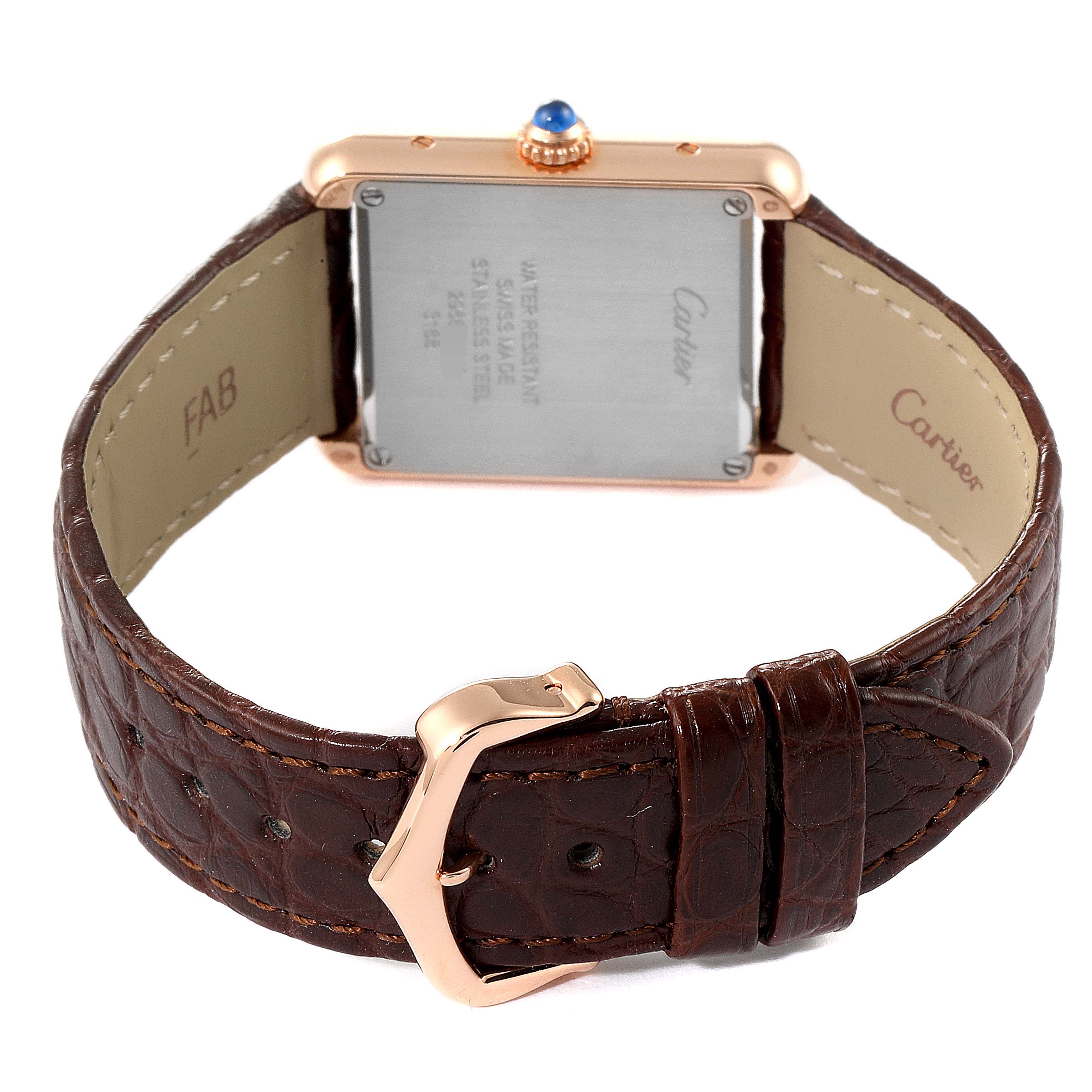 This image shows the back of the Cartier Tank Solo W5200024 Women's Rose Gold Silver Dial W5200024 Women's Rose Gold Silver Dial watch with its leather strap and buckle.