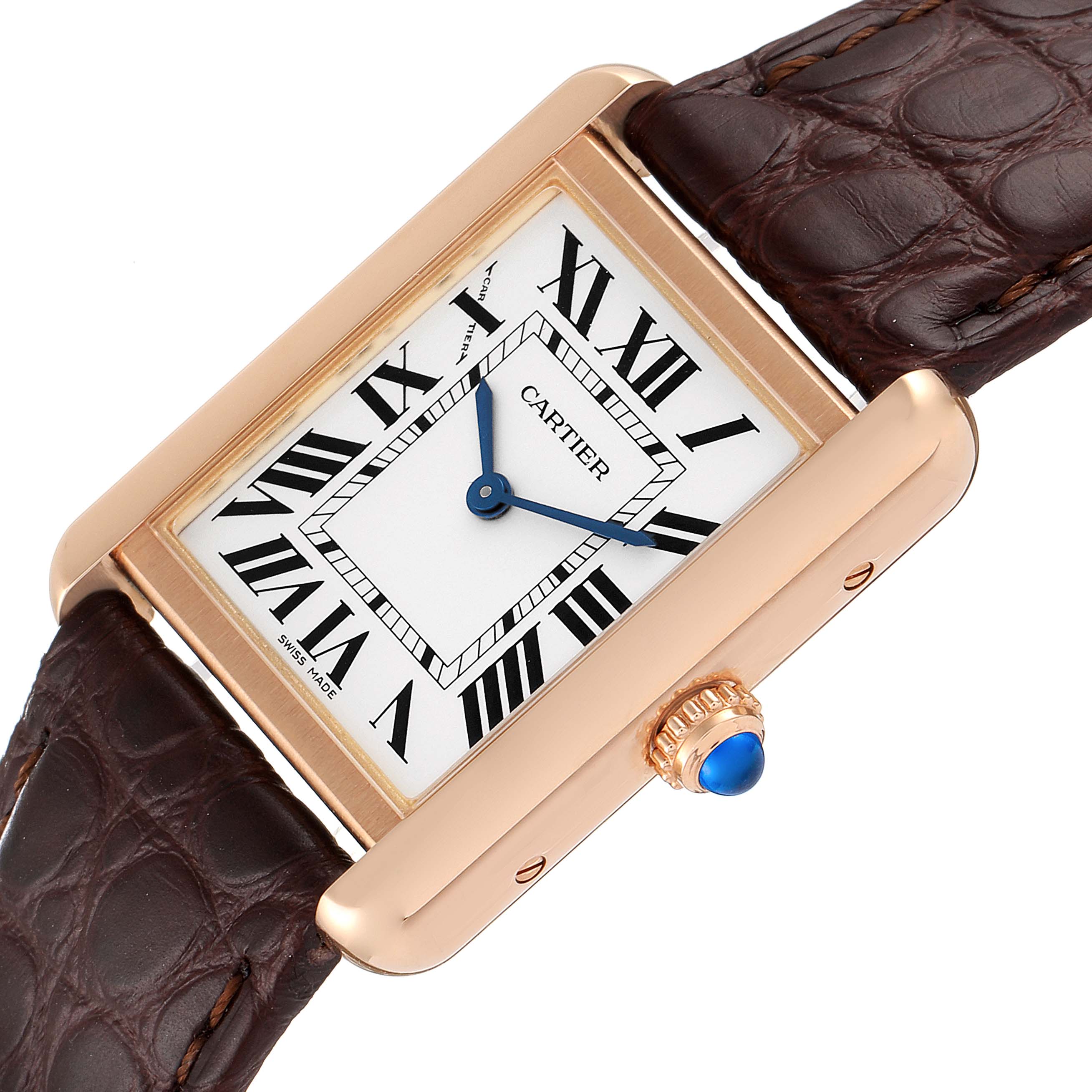 The image shows a close-up angle of a Cartier Tank Solo W5200024 Women's Rose Gold Silver Dial W5200024 Women's Rose Gold Silver Dial watch, highlighting the face, bezel, and leather strap.
