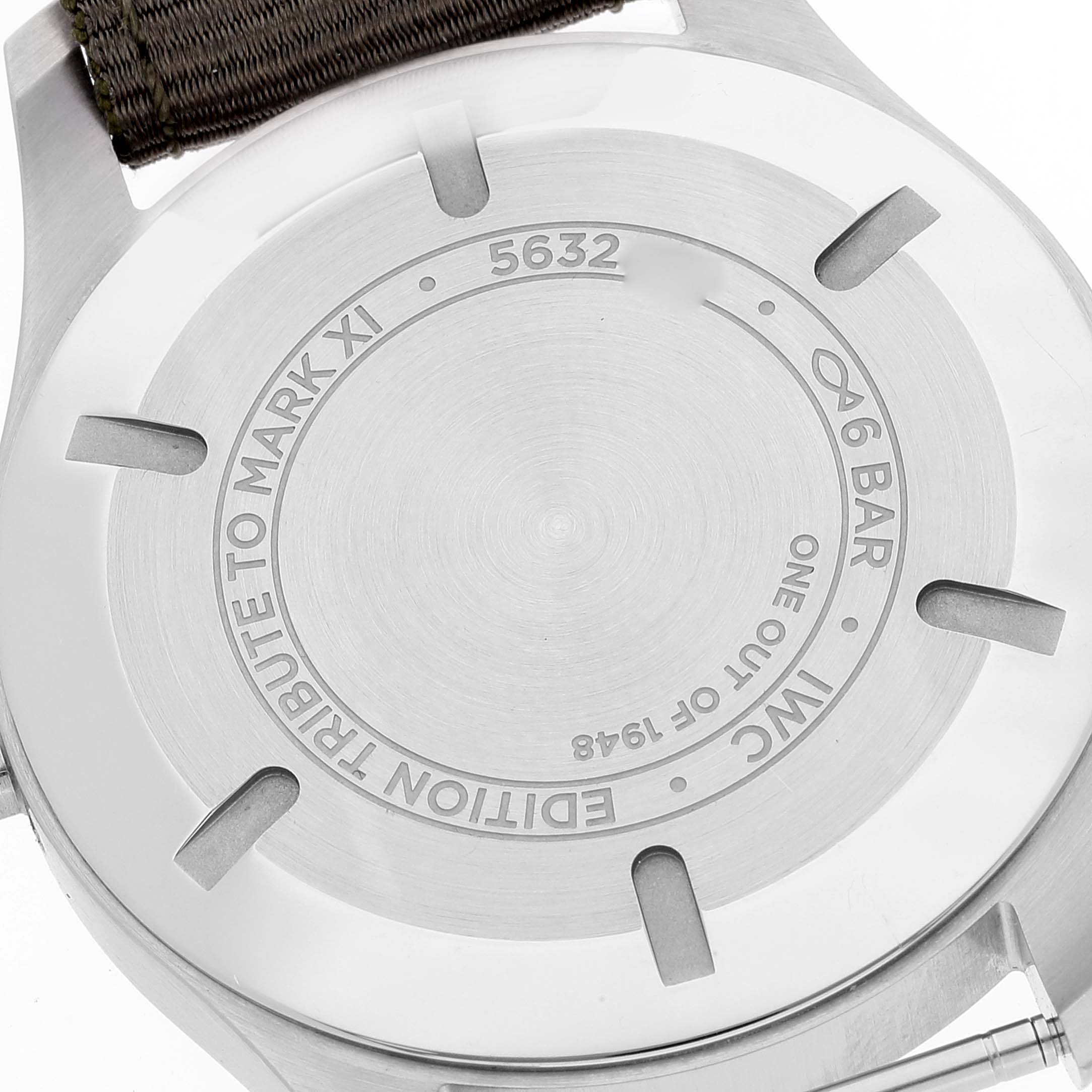 The image shows the back case of the IWC Pilot IW327007 Men's Stainless Steel Black Dial IW327007 Men's Stainless Steel Black Dial model watch, highlighting its engravings and strap attachment points.