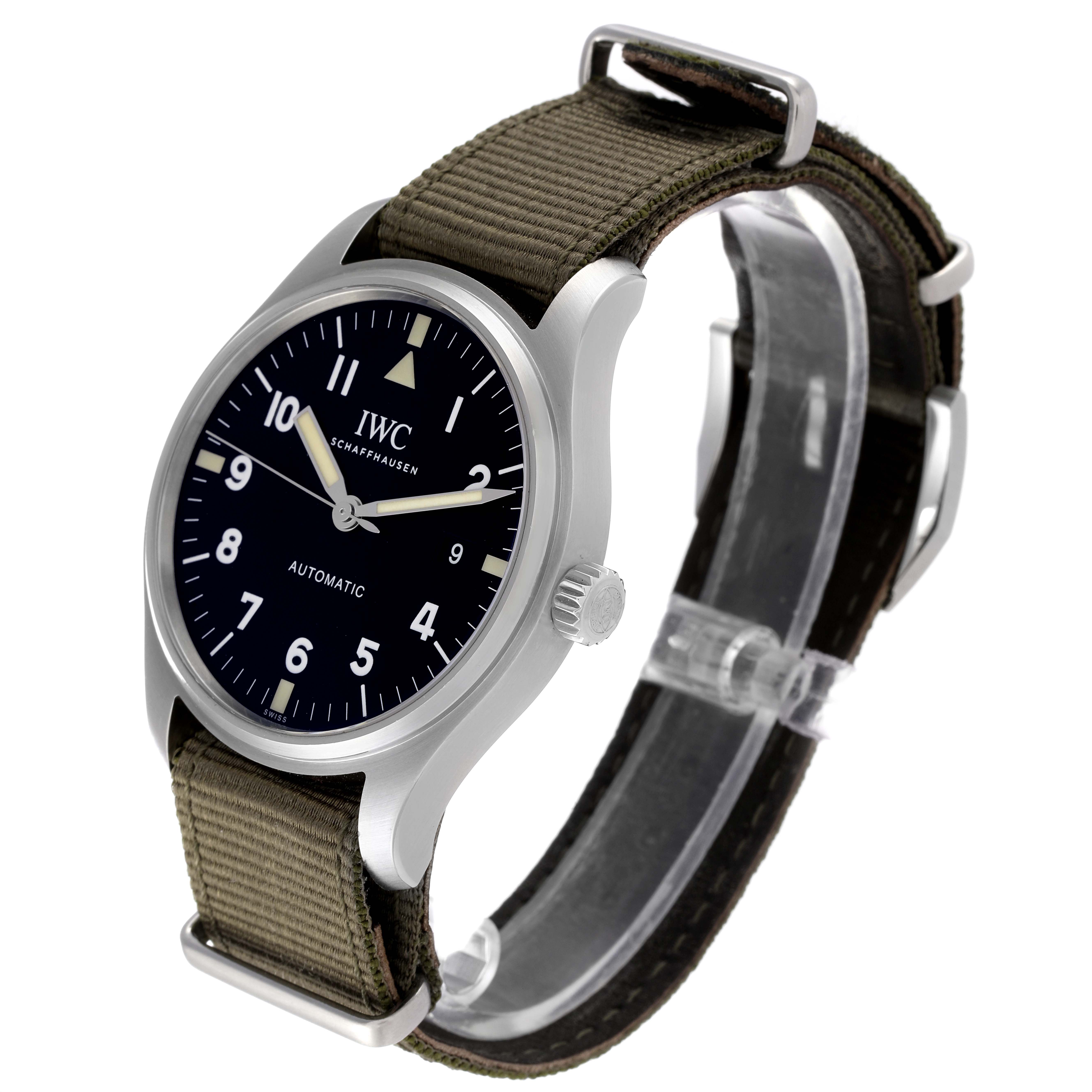 The watch is an IWC Pilot IW327007 Men's Stainless Steel Black Dial IW327007 Men's Stainless Steel Black Dial model shown at a three-quarter angle, highlighting the face, crown, and olive green strap.