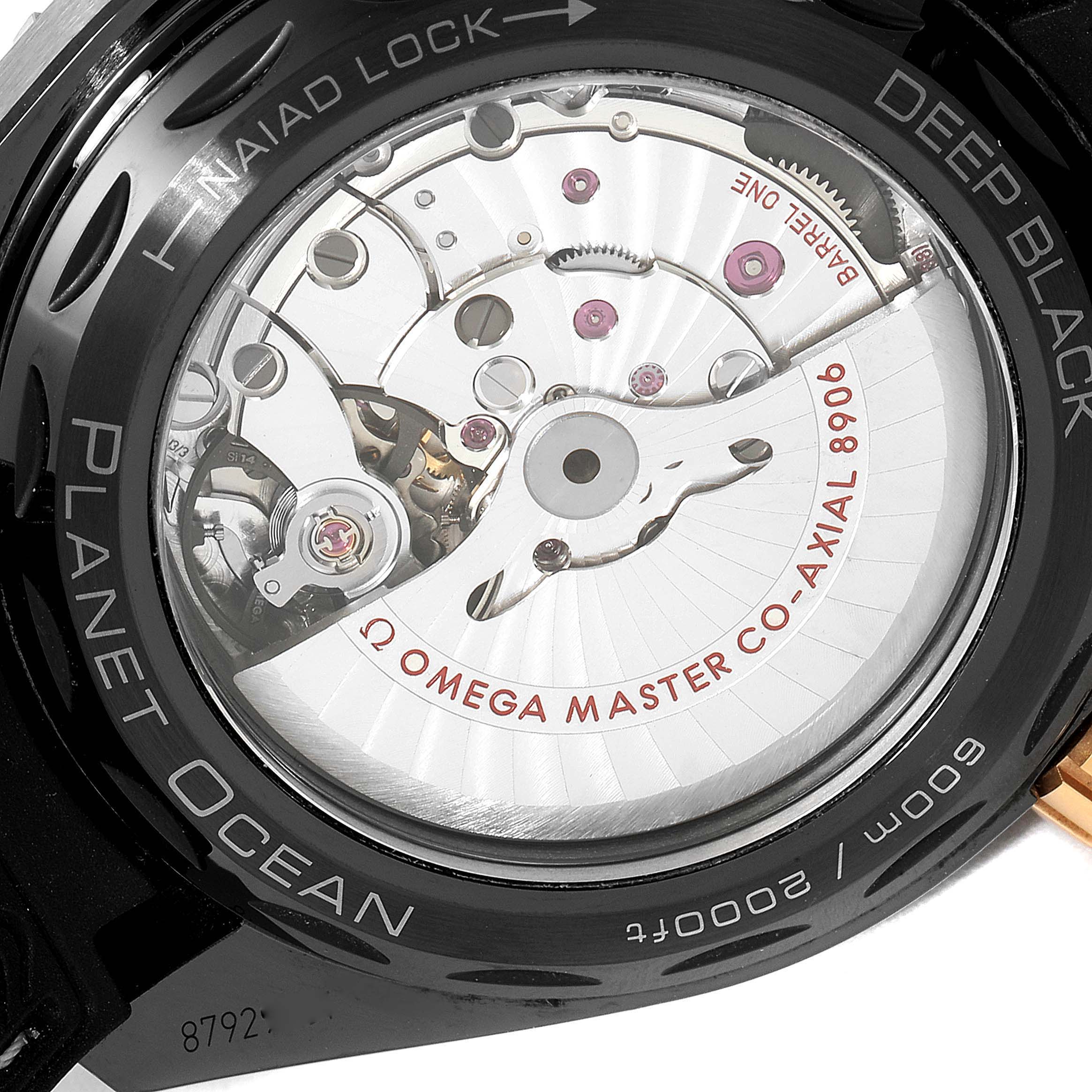 The image shows the transparent case back of the Omega Planet Ocean 215.63.46.22.01.001 Men's Ceramic Black Dial 215.63.46.22.01.001 Men's Ceramic Black Dial watch, revealing the Co-Axial Master Chronometer 8906 movement.