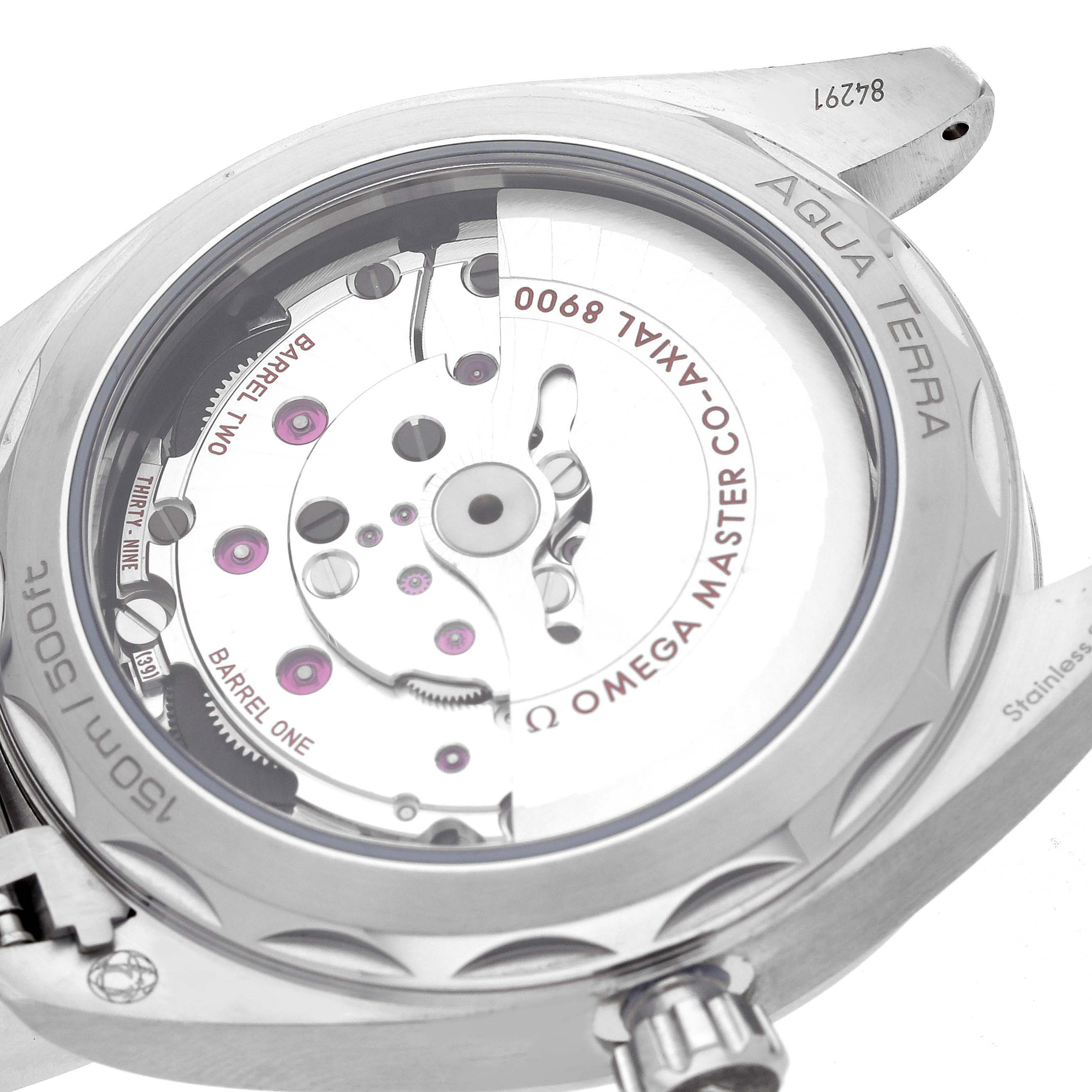 The image shows the back of the Omega Aqua Terra 220.10.41.21.10.001 Men
s Stainless Steel Green Dial watch, highlighting its inner movement and "150m/500ft" water resistance.