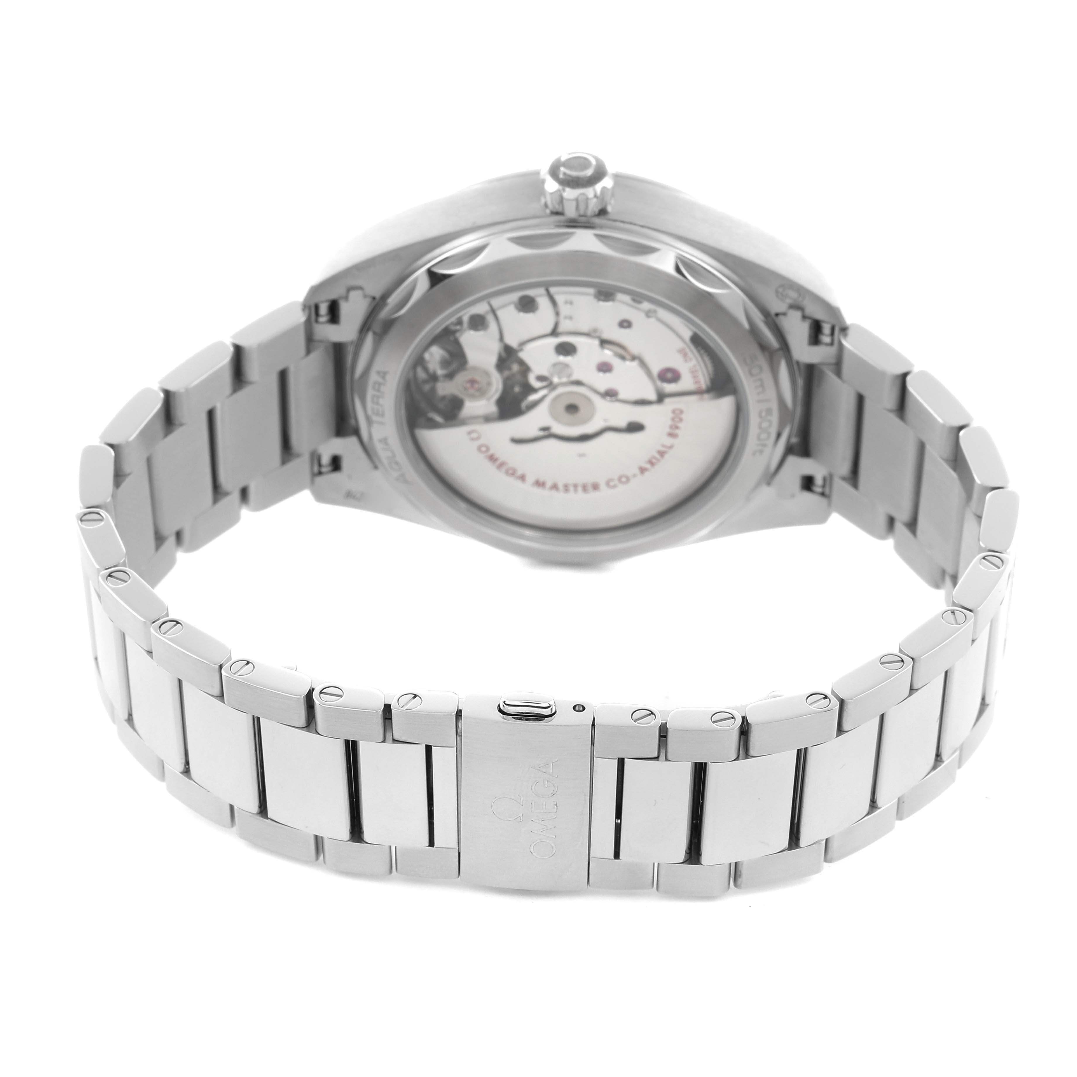 The image shows the back of the Omega Aqua Terra 220.10.41.21.10.001 Men
s Stainless Steel Green Dial watch, highlighting the movement and metal bracelet design.