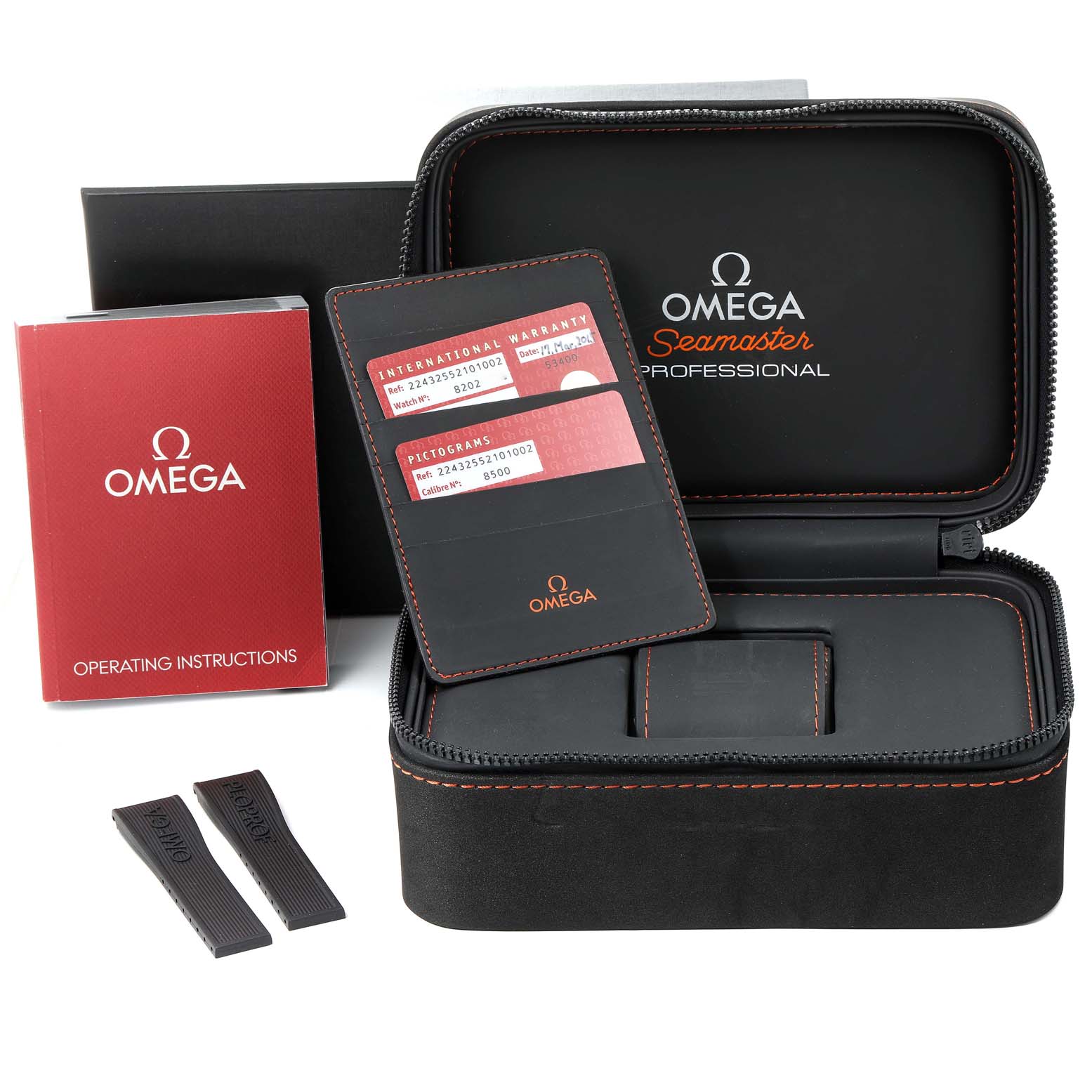 The image shows the case, manuals, warranty cards, and accessories for an Omega Seamaster Ploprof model.