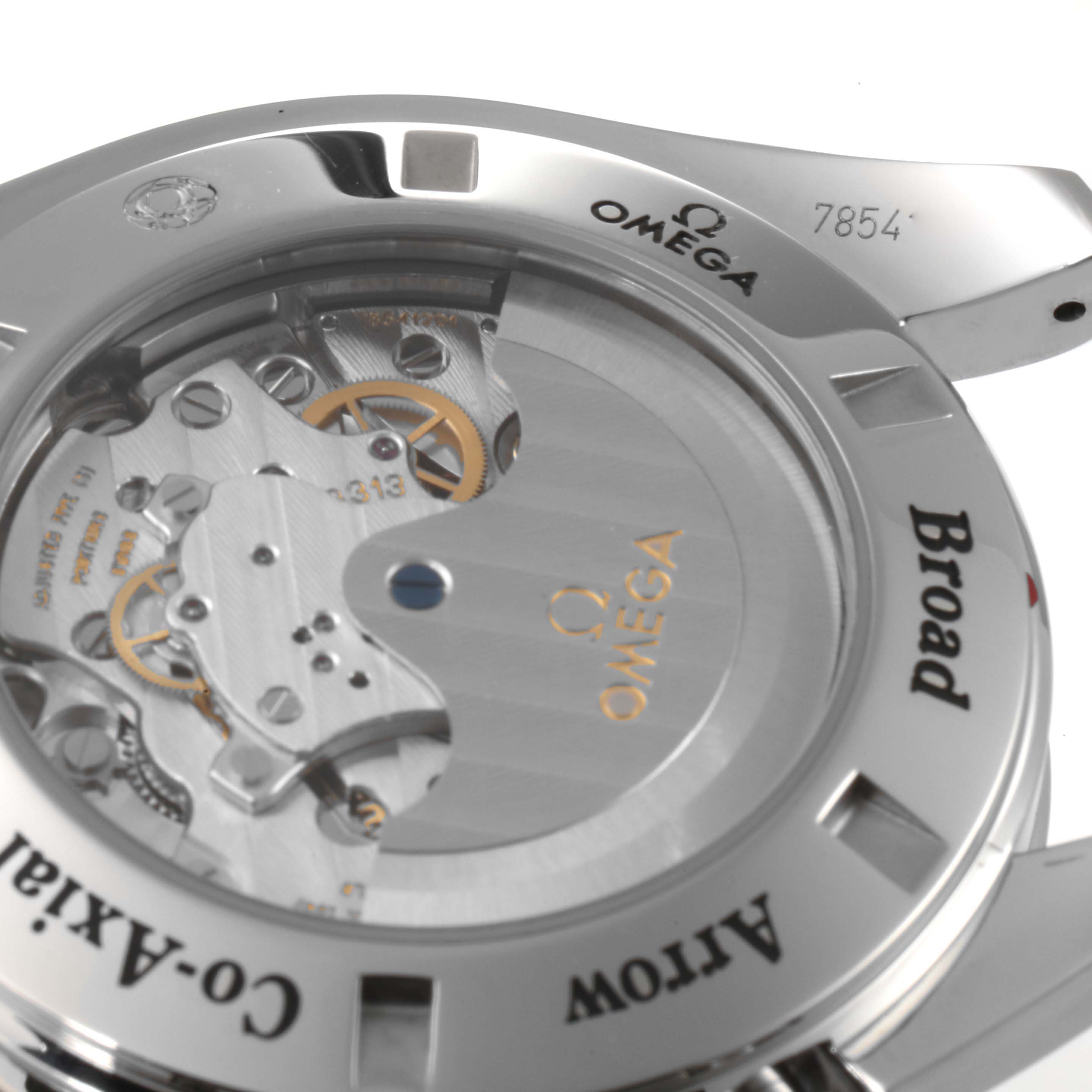 This image shows a close-up of the transparent case back of an Omega Speedmaster 321.10.44.50.01.001 Men
s Stainless Steel Black Dial 321.10.44.50.01.001 Men
s Stainless Steel Black Dial, revealing the inner mechanical movement.