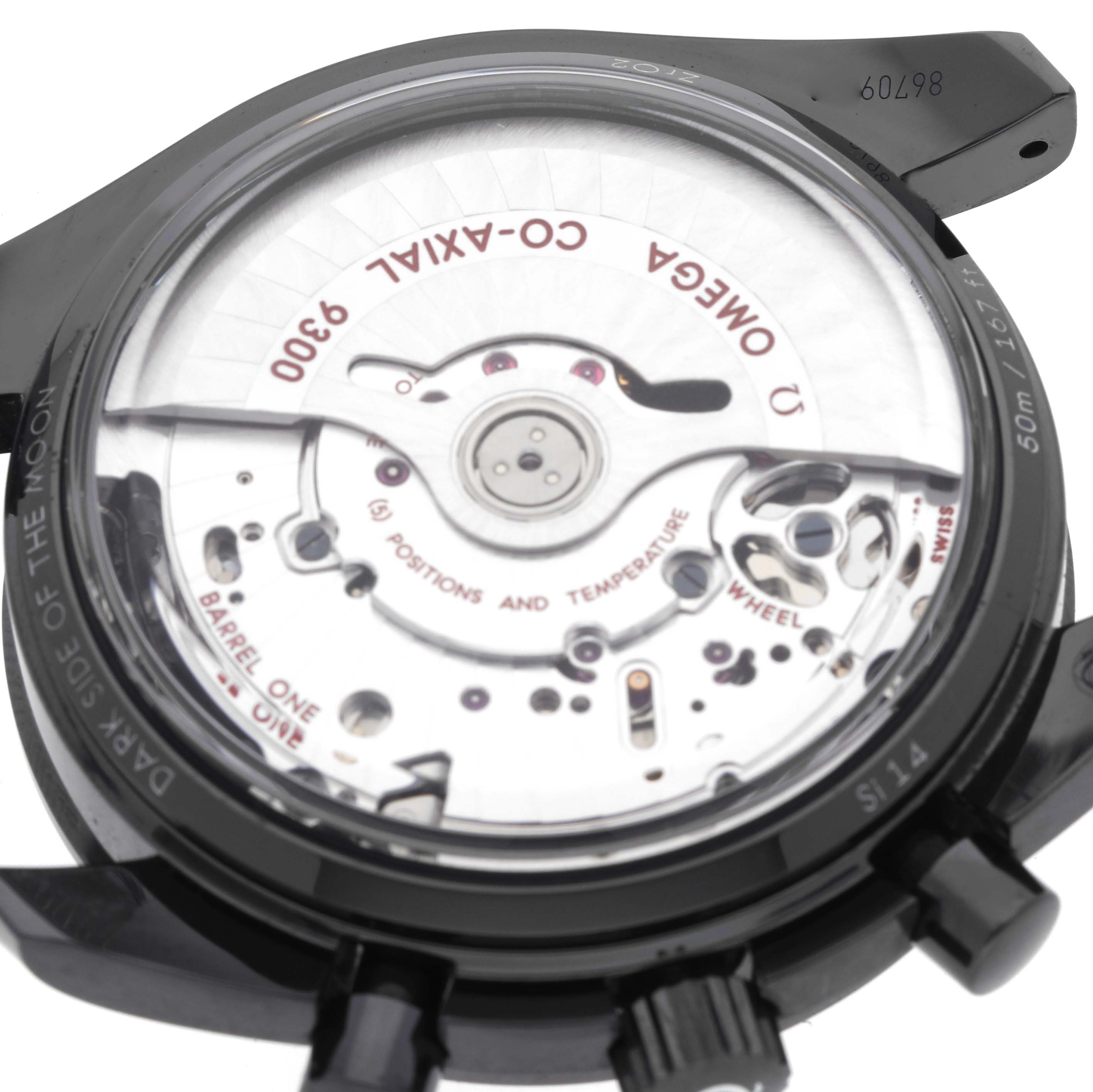 The image shows the back of an Omega Speedmaster O311.92.44.51.01.003 Men
s Ceramic Black Dial, highlighting the Co-Axial 9300 movement and case details.