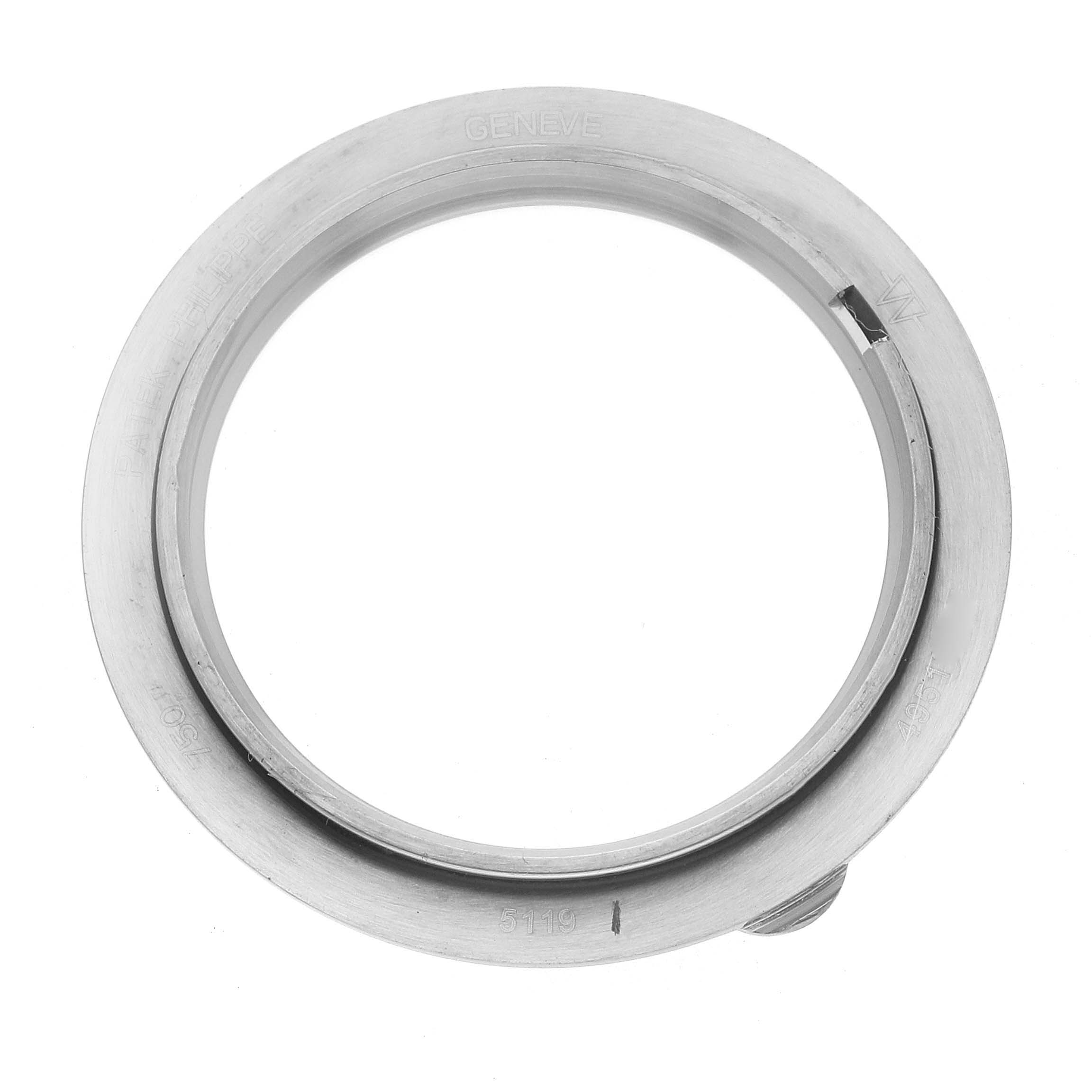 The image shows a top-down view of a Patek Philippe Calatrava 5119G-001 Men
s White Gold White Dial watch bezel or case part, showcasing its circular metal design.