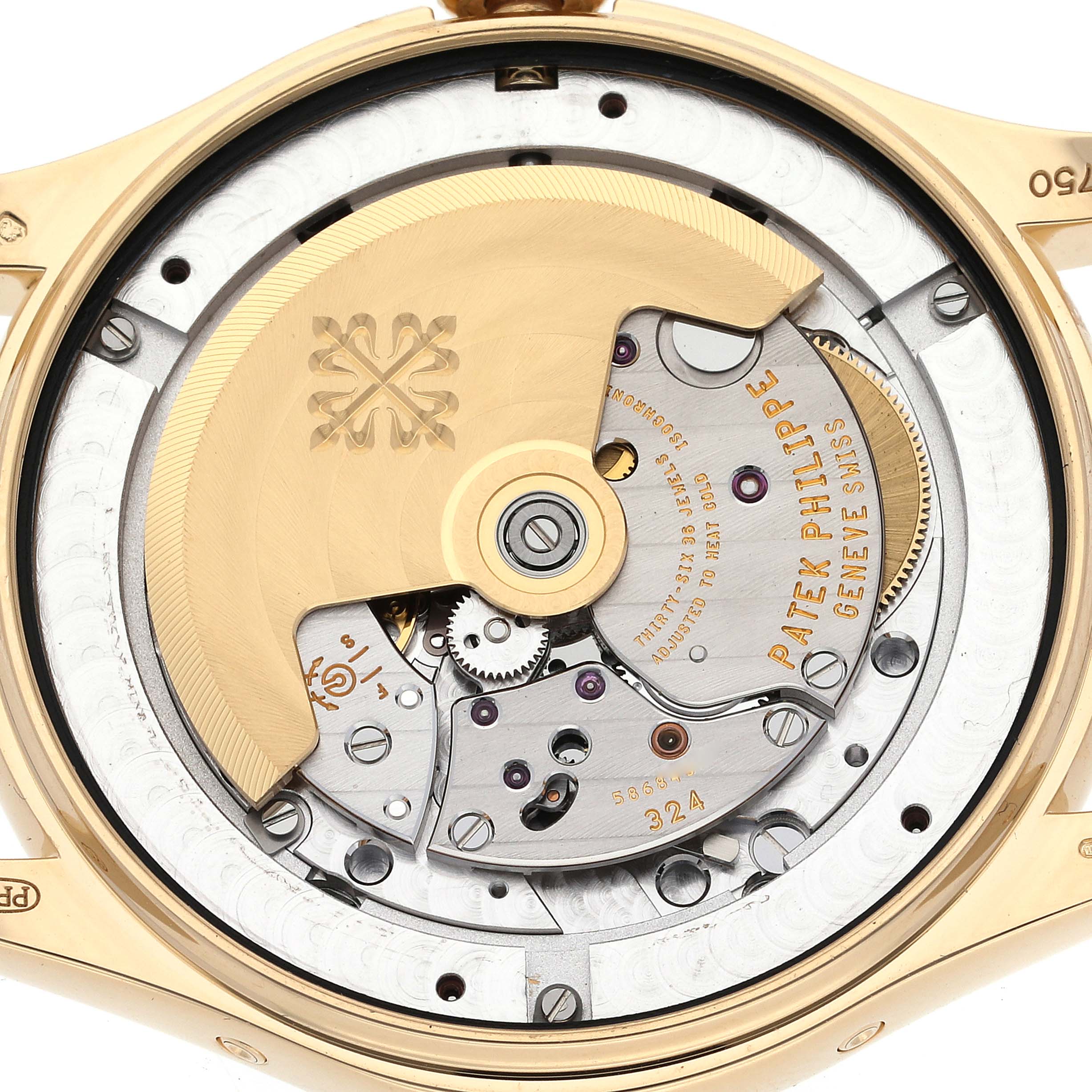 The image shows the movement from the back of the Patek Philippe Complications 5146J-010 Men
s Yellow Gold Grey Dial watch, highlighting its rotor and intricate mechanisms.