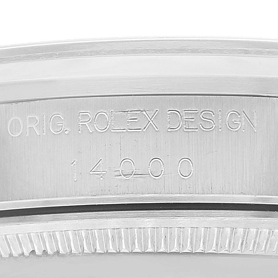 This is a close-up image showing the engraved inner bezel of the Air-King watch by Rolex.