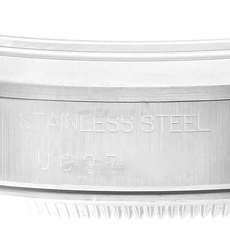 The image shows a close-up view of the engraved stainless steel back of a Rolex Air-King 14000M Men's Stainless Steel Black Dial 14000M Men's Stainless Steel Black Dial watch.