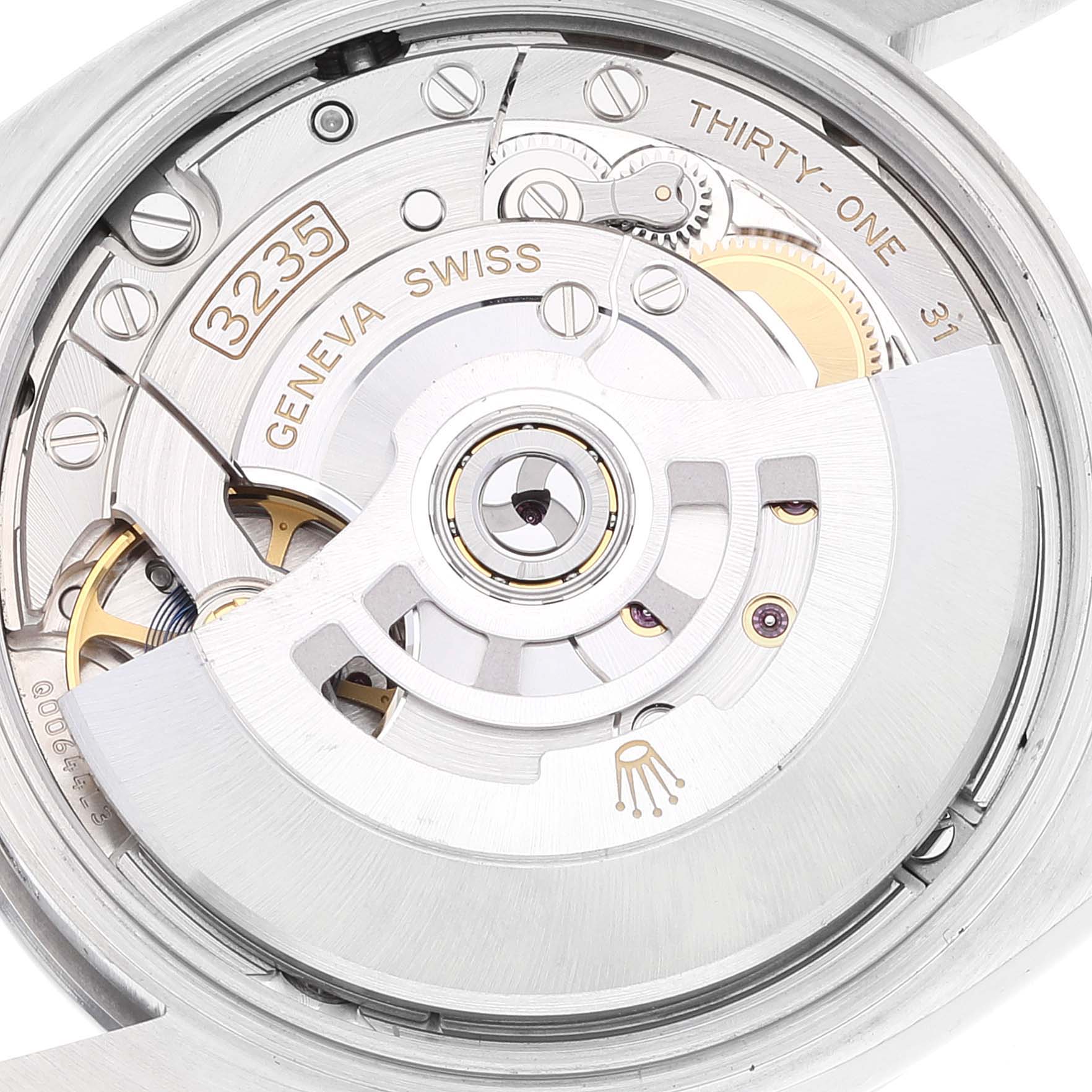 This image shows a close-up of the Rolex Datejust 126200 Men's Stainless Steel Blue Dial 126200 Men's Stainless Steel Blue Dial watch movement, specifically the Caliber 3235 components.