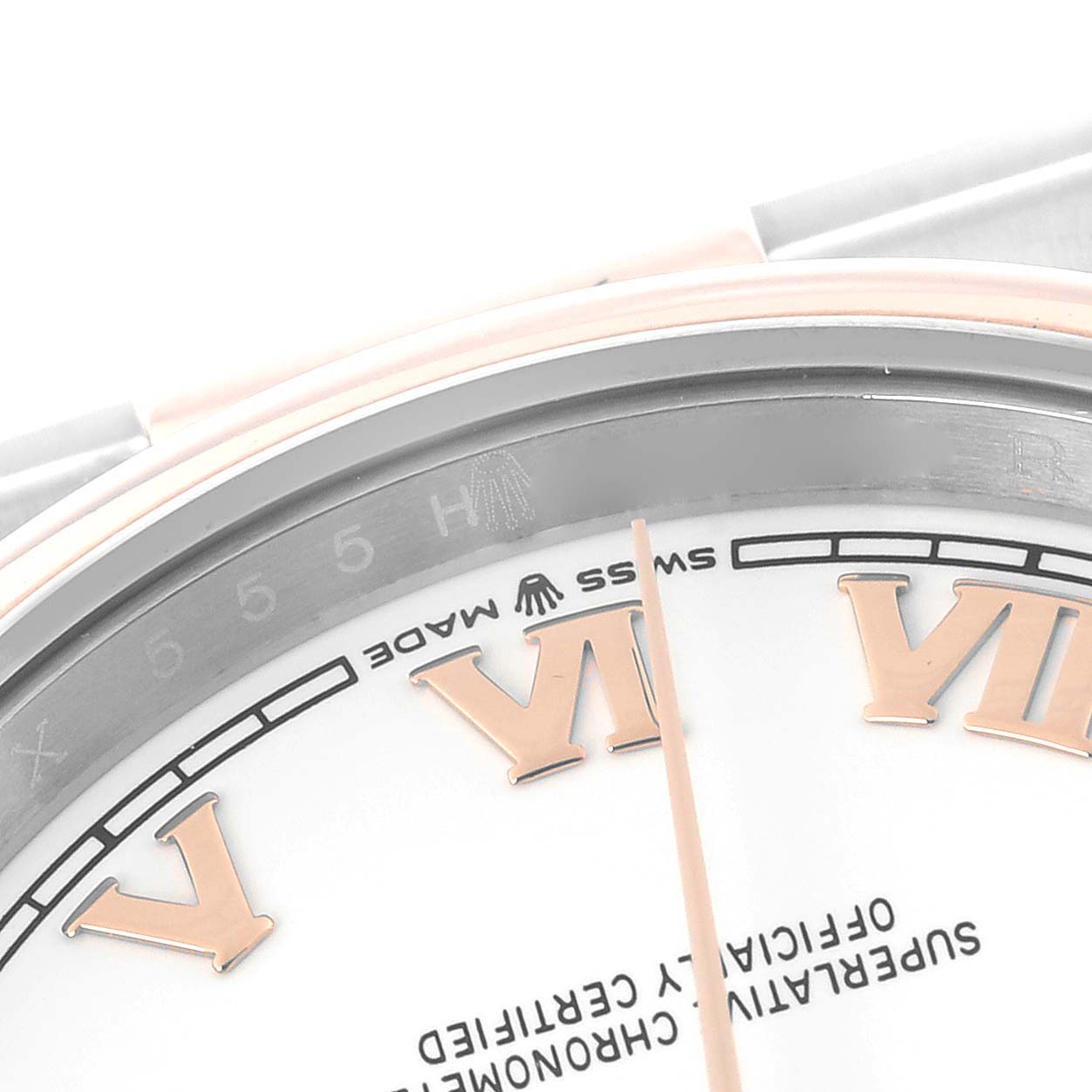 The image shows a close-up of the dial, Roman numeral markers, and 
Swiss Made
 text on a Rolex Datejust 126201 Men
s Steel and Gold (two tone) White Dial 126201 Men
s Steel and Gold (two tone) White Dial watch.