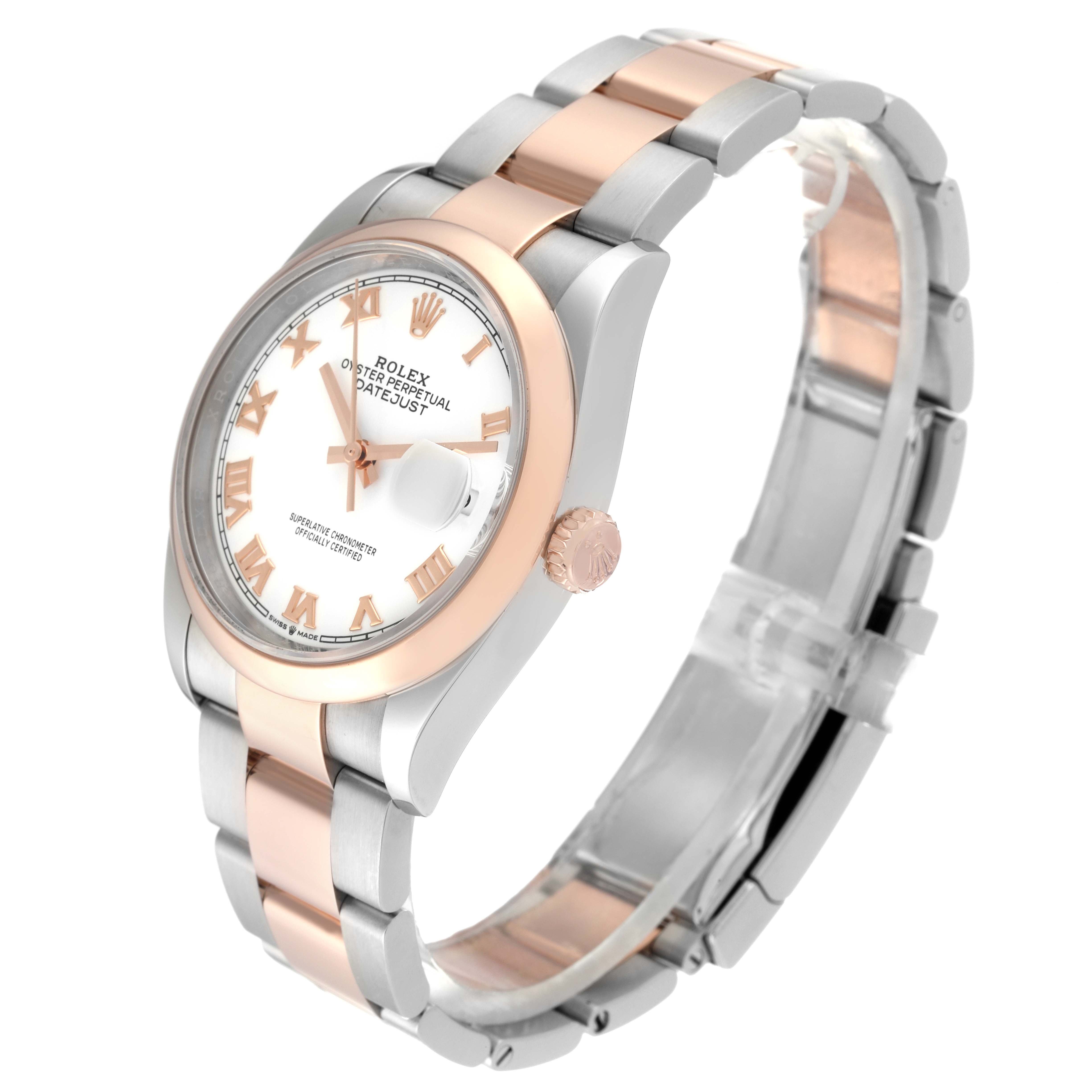 The Rolex Datejust 126201 Men
s Steel and Gold (two tone) White Dial 126201 Men
s Steel and Gold (two tone) White Dial watch is shown at a three-quarter angle, revealing its dial, bezel, crown, and two-tone bracelet.