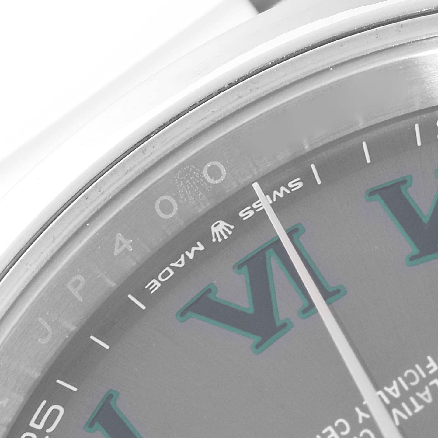 This image shows a close-up of the dial and bezel of a Rolex Datejust 41 126300 Men's Stainless Steel Grey Dial 126300 Men's Stainless Steel Grey Dial watch, highlighting the "Swiss Made" text.
