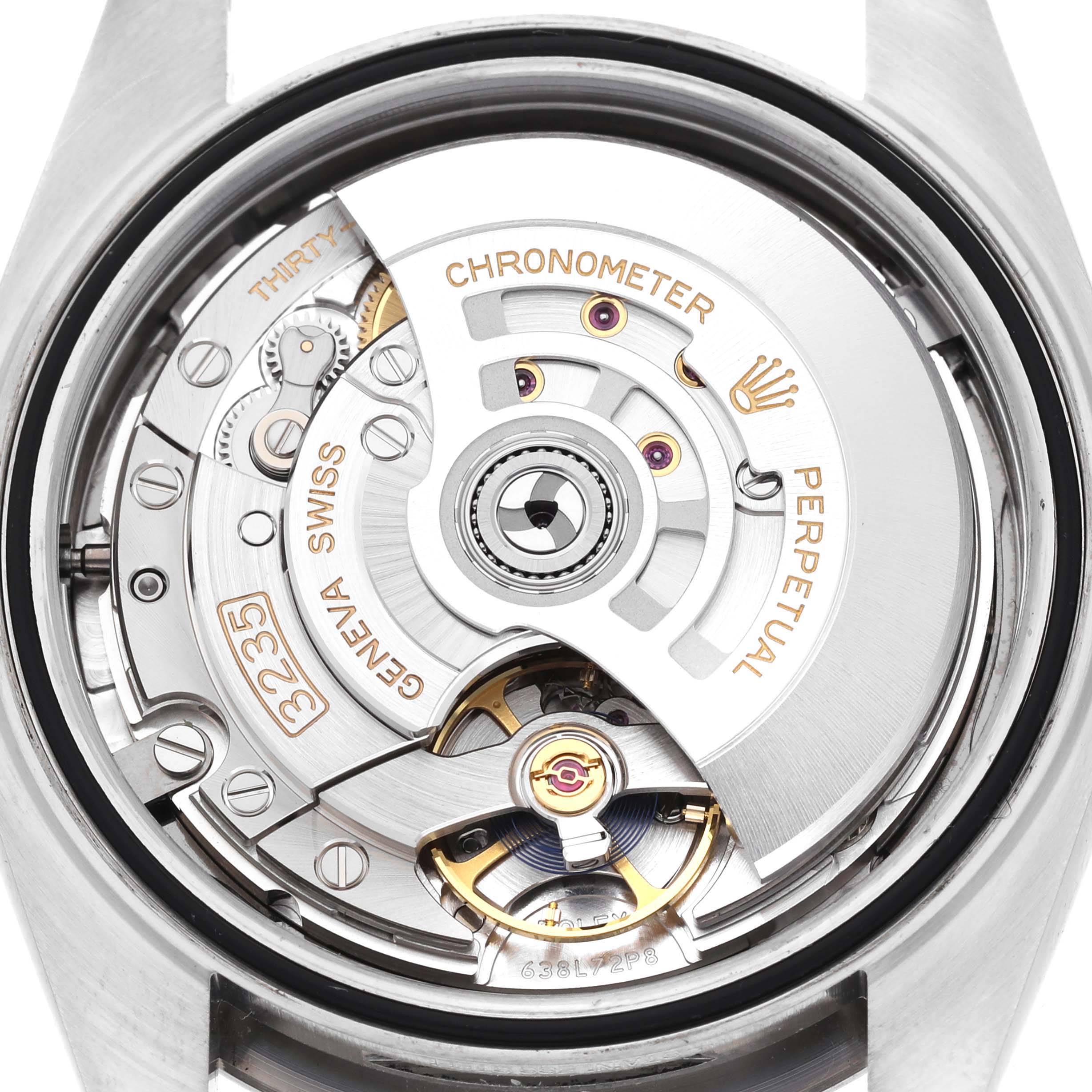 This image shows the internal mechanism of a Rolex Datejust 41 126334 Men
s Stainless Steel Grey Dial 126334 Men
s Stainless Steel Grey Dial watch, highlighting the movement components and engravings.