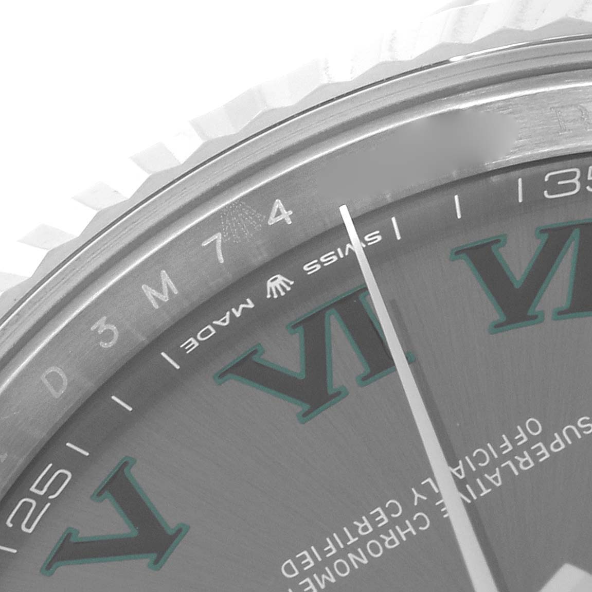 This image shows a close-up of the dial and fluted bezel of a Rolex Datejust 41 126334 Men
s Stainless Steel Grey Dial 126334 Men
s Stainless Steel Grey Dial watch, highlighting the Roman numerals and "Swiss Made" text.