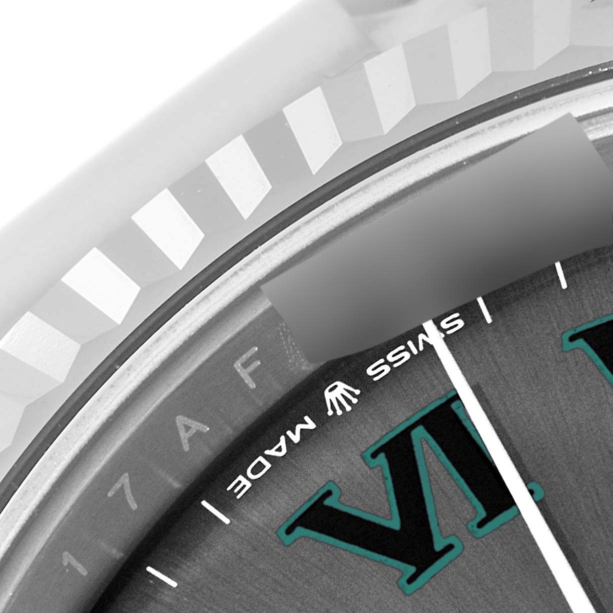 This close-up image shows the bezel and part of the dial, including the "Swiss Made" text, of a Rolex Datejust 41 126334 Men's Stainless Steel Grey Dial 126334 Men's Stainless Steel Grey Dial watch.