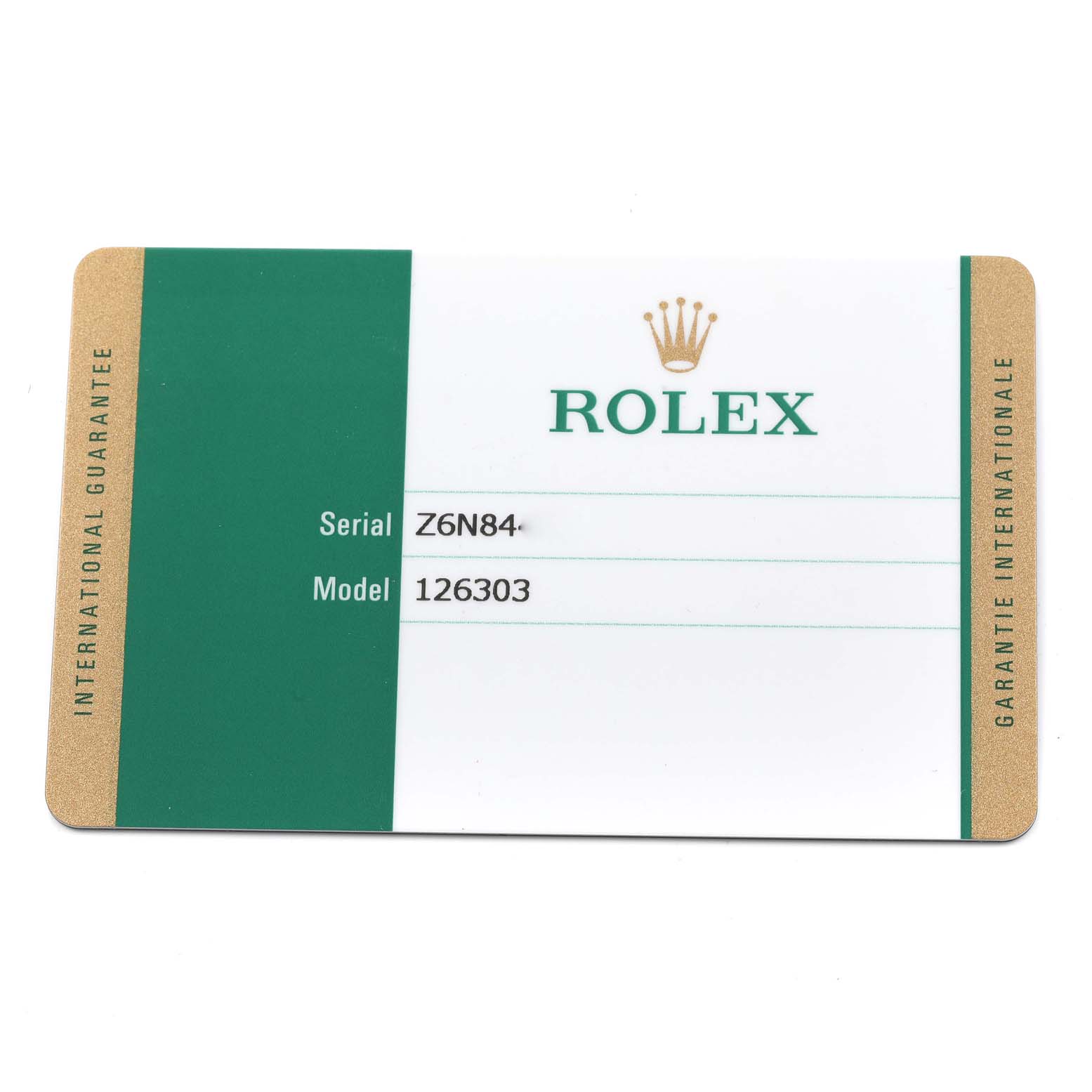 This is an image of the serial and model card for the Rolex Datejust 41 126303 Men's Steel and Gold (two tone) Grey Dial 126303 Men's Steel and Gold (two tone) Grey Dial, showing serial number Z6N84 and model number 126303.