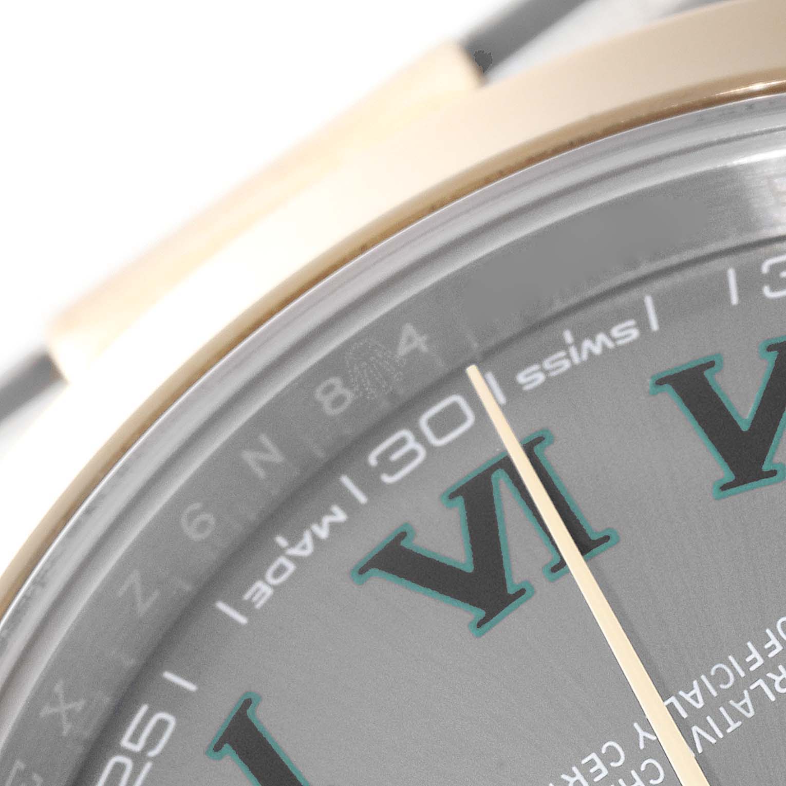 This image shows a close-up angle of the dial and bezel edge of the Rolex Datejust 41 126303 Men's Steel and Gold (two tone) Grey Dial 126303 Men's Steel and Gold (two tone) Grey Dial with focus on the hour markers and minute hand.