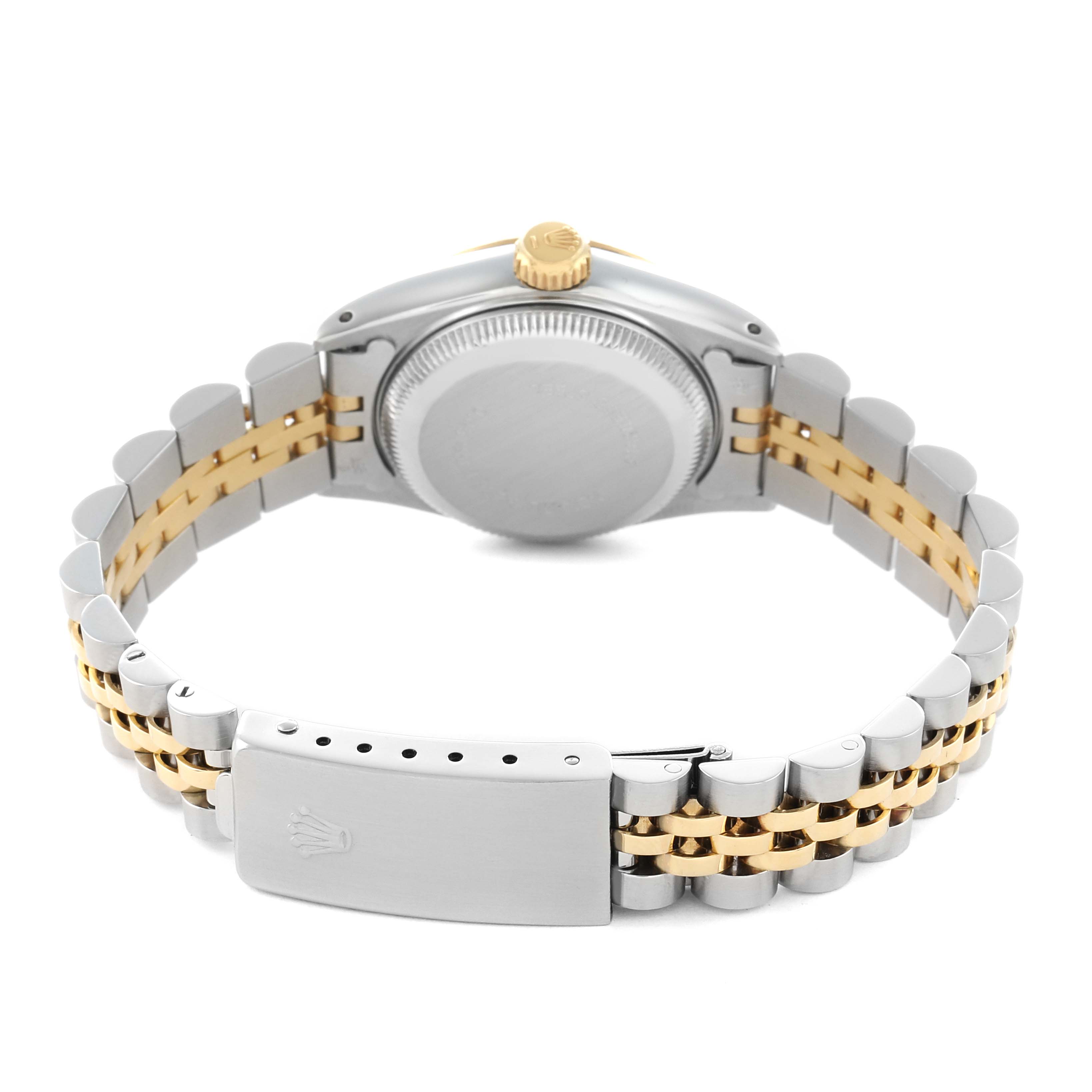 The image shows the back view of a Rolex Datejust 69173 Women
s Steel and Gold (two tone) Blue Dial watch, highlighting the case back, crown, and two-tone bracelet with the clasp.
