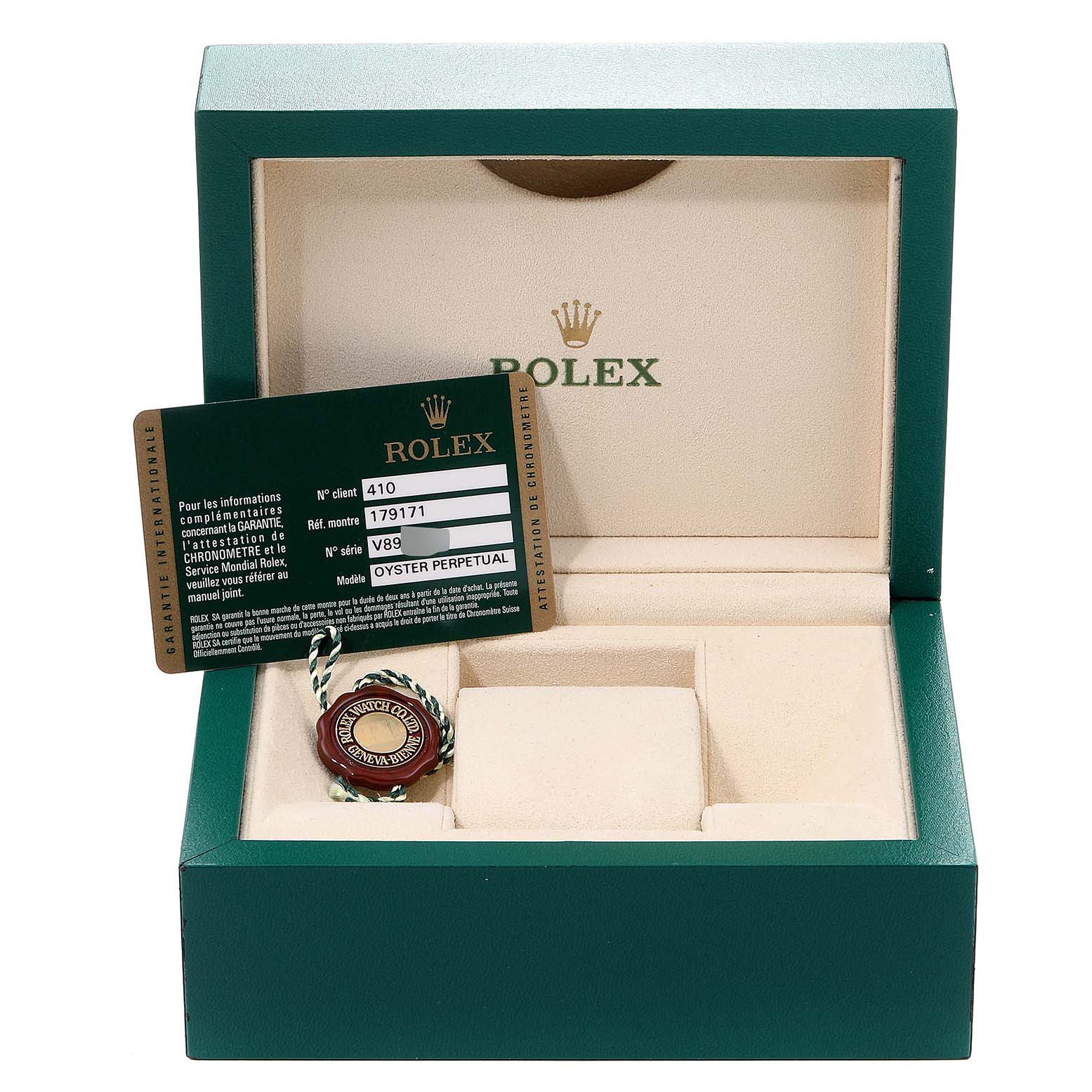 This image shows a Rolex Datejust 179171 Women's Steel and Gold (two tone) Black Dial 179171 Women's Steel and Gold (two tone) Black Dial model box with a warranty card and a tag inside.