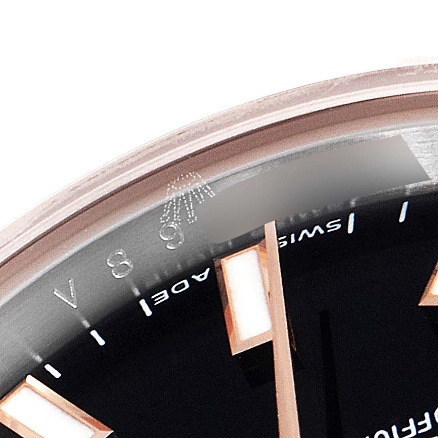 This image shows a close-up of the dial of a Rolex Datejust 179171 Women's Steel and Gold (two tone) Black Dial 179171 Women's Steel and Gold (two tone) Black Dial watch focusing on the 8 o'clock marker.