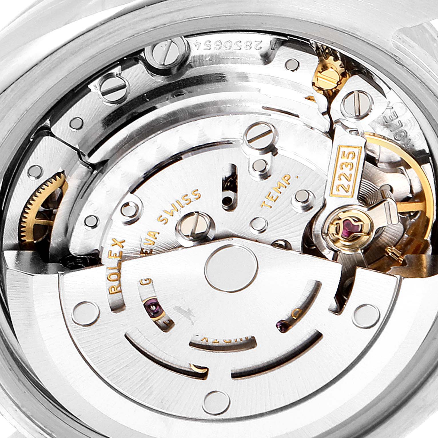 This is an angled view of the Rolex Datejust 179171 Women's Steel and Gold (two tone) Black Dial 179171 Women's Steel and Gold (two tone) Black Dial movement, showing intricate mechanisms and engravings.