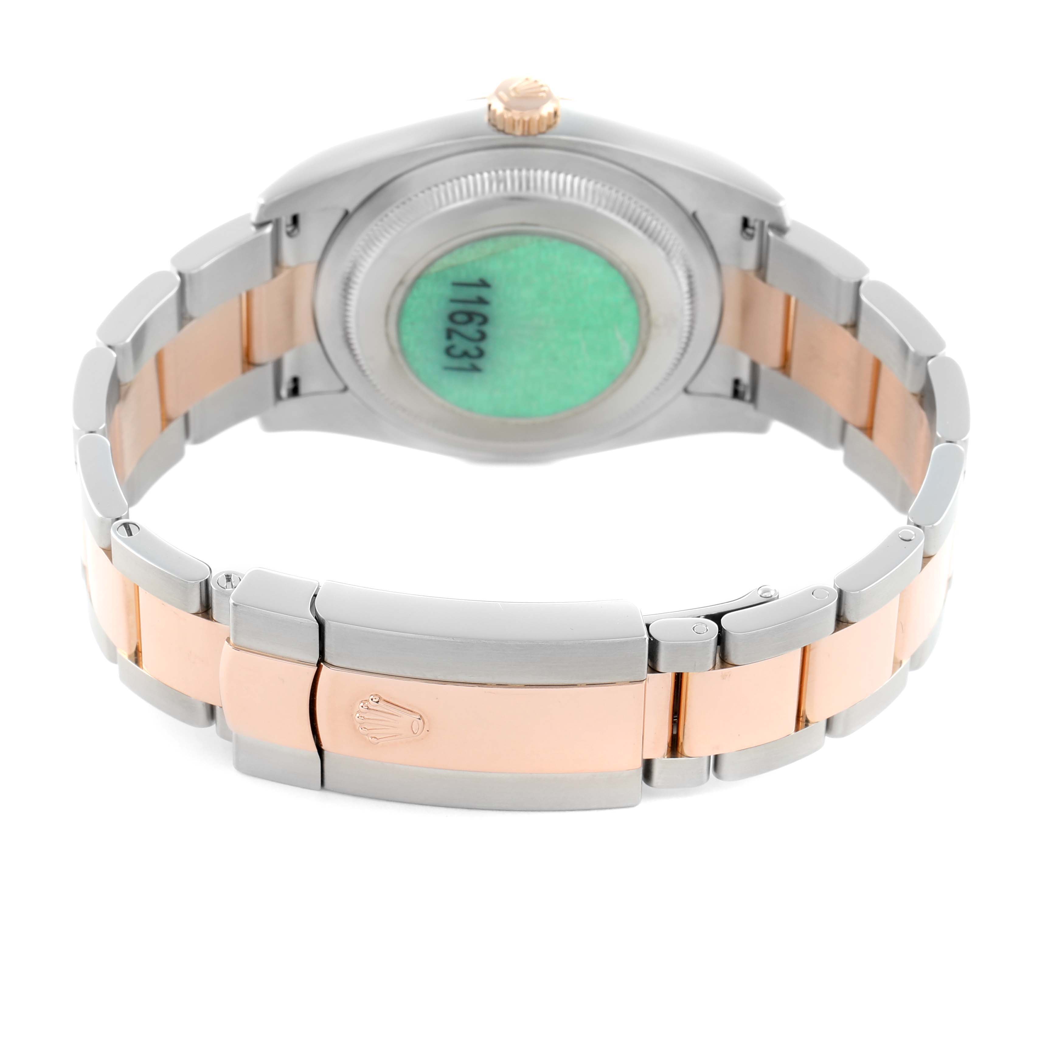 The Rolex Datejust 116231 Men
s Steel and Gold (two tone) Mother of Pearl Dial watch is shown from the back, highlighting the case back, bracelet, and clasp with crown logo.