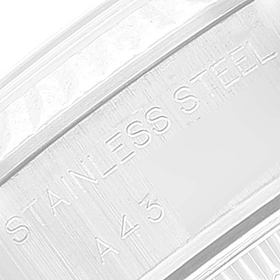 This image shows a close-up of the Rolex Datejust 69174 Women
s Stainless Steel Blue Dial 69174 Women
s Stainless Steel Blue Dial
s stainless steel band with inscribed markings.