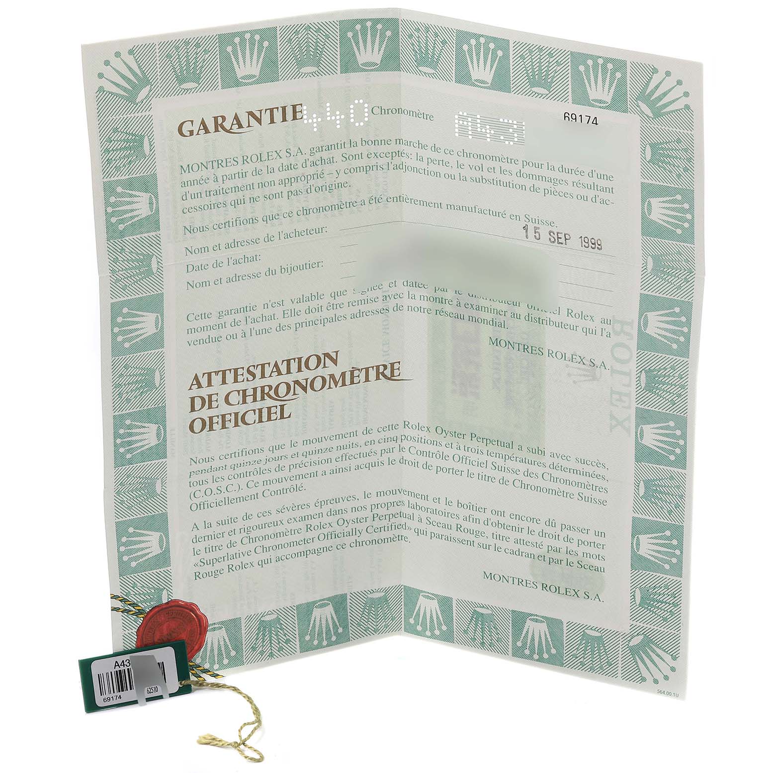 This image shows the guarantee certificate and official chronometer certification for a Rolex Datejust 69174 Women
s Stainless Steel Blue Dial 69174 Women
s Stainless Steel Blue Dial model watch, along with a tag and seal.
