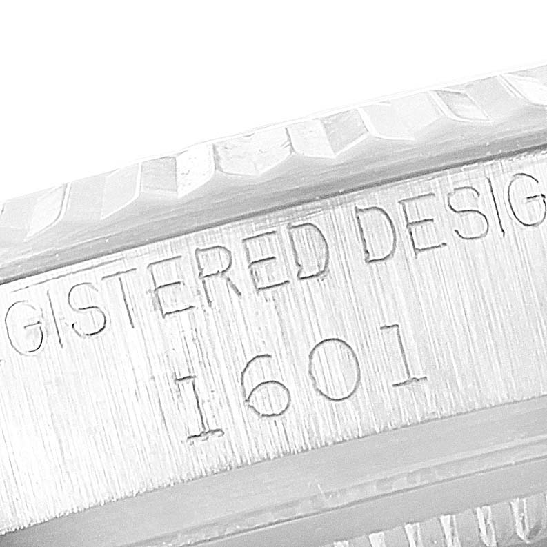 Close-up of the case side, including the model number "1601" from the Vintage Collection by Rolex.