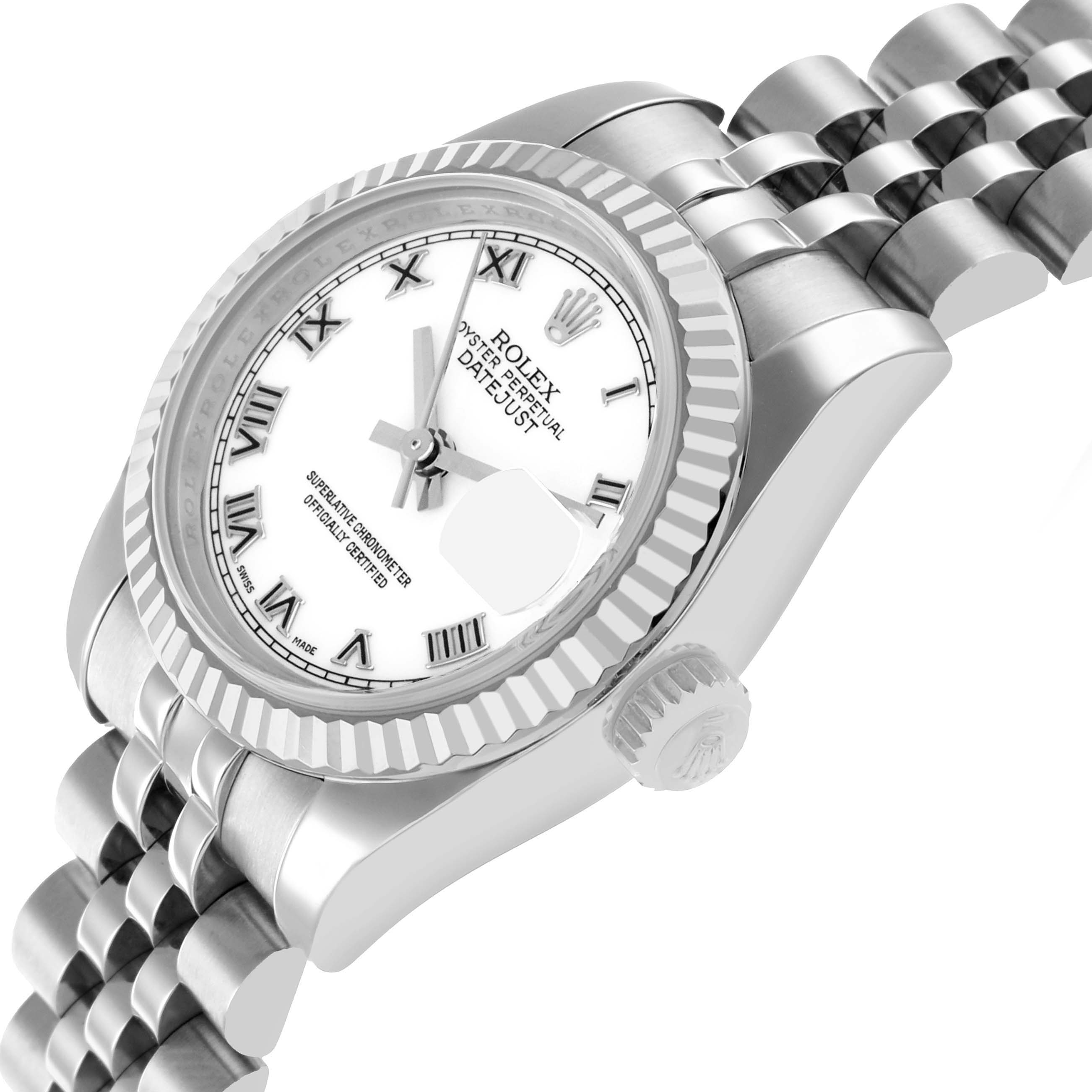 The Rolex Datejust 179174 Women
s Stainless Steel White Dial watch is shown from a side angle, highlighting the dial, bezel, crown, and part of the bracelet.